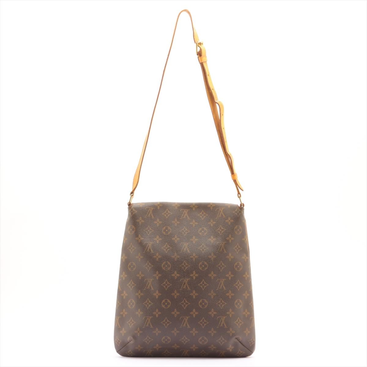 Brown and tan monogram coated canvas Louis Vuitton Musette Salsa GM with gold-tone hardware, tan vachetta leather accents, adjustable flat short shoulder strap, brown Taiga leather and marigold Alcantara lining, single pocket at interior wall and