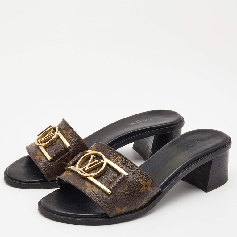 Louis Vuitton Mule low Lock it sandals Brown Black Leather ref