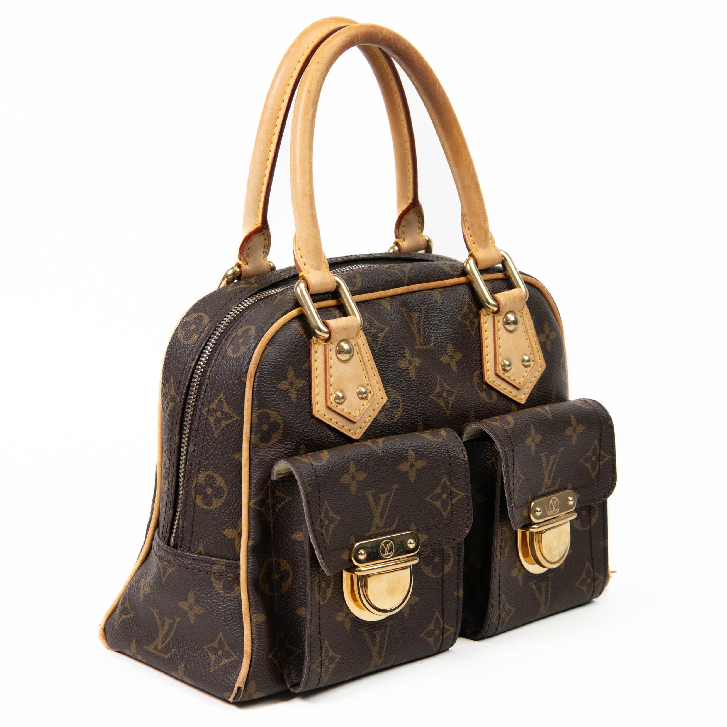 100% Authentic

This chic handbag is finely crafted of classic Louis Vuitton monogram coated canvas in the smaller size. The handbag features tall vachetta cowhide rolled leather top handles and trim, two front external pockets, and polished brass