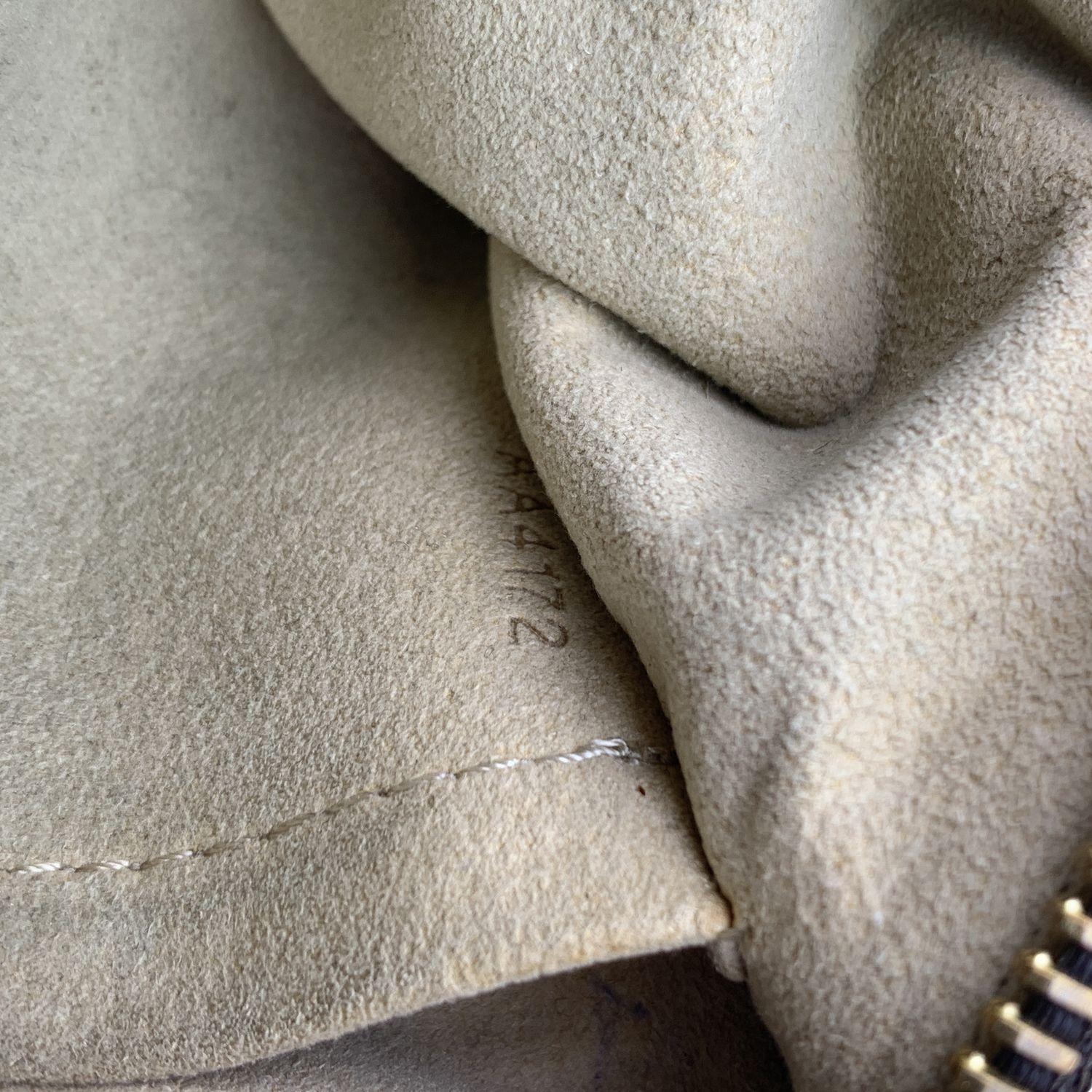 Mini bolso de lona con monograma marrón Milla de Louis Vuitton con cadena 1