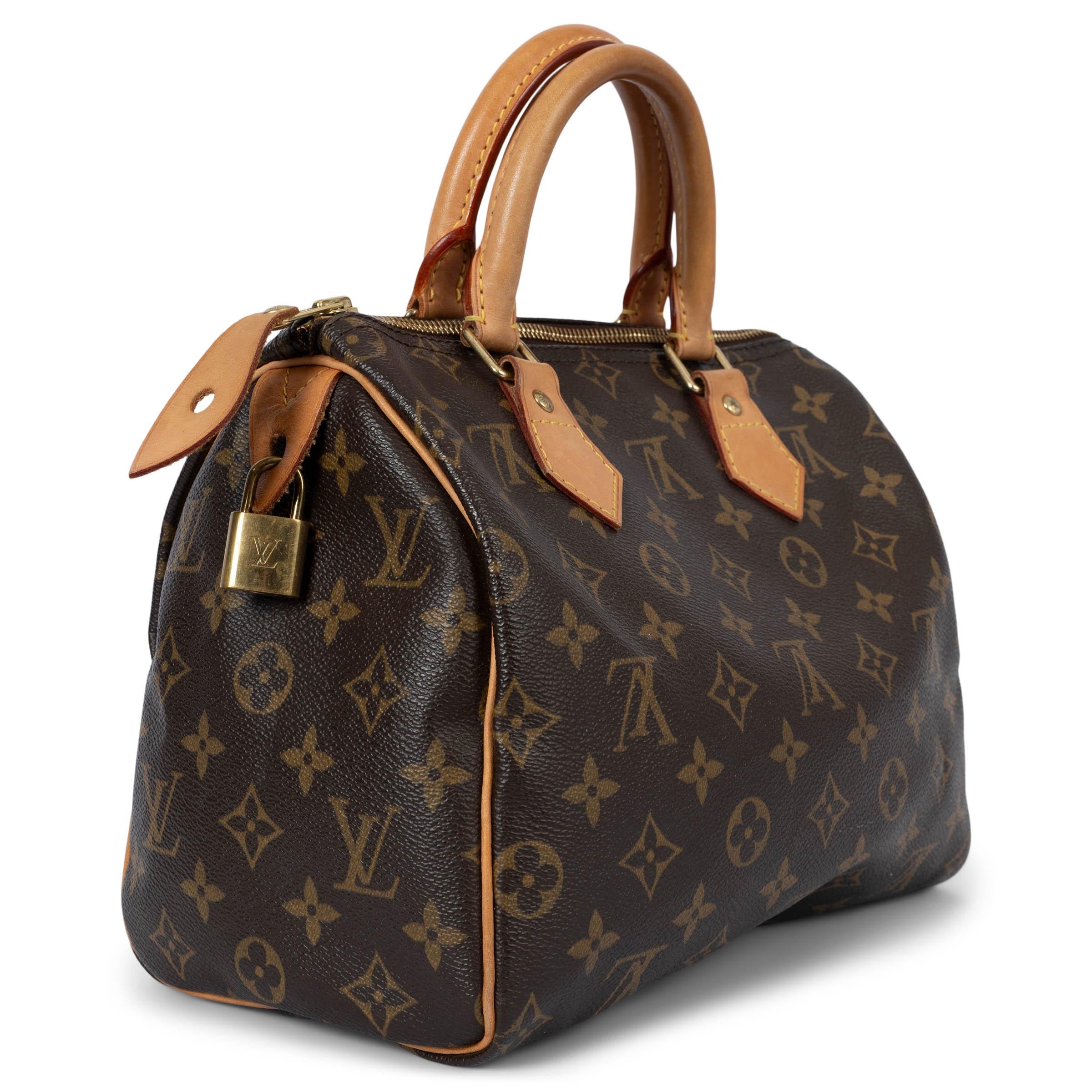 100% authentic Louis Vuitton Speedy 25 bag in signature brown and camel monogram canvas featuring Vachetta leather shoulder-strap, handles and trimming. Originally created for travelers in the 1930s – the name refers to the era’s rapid transit –