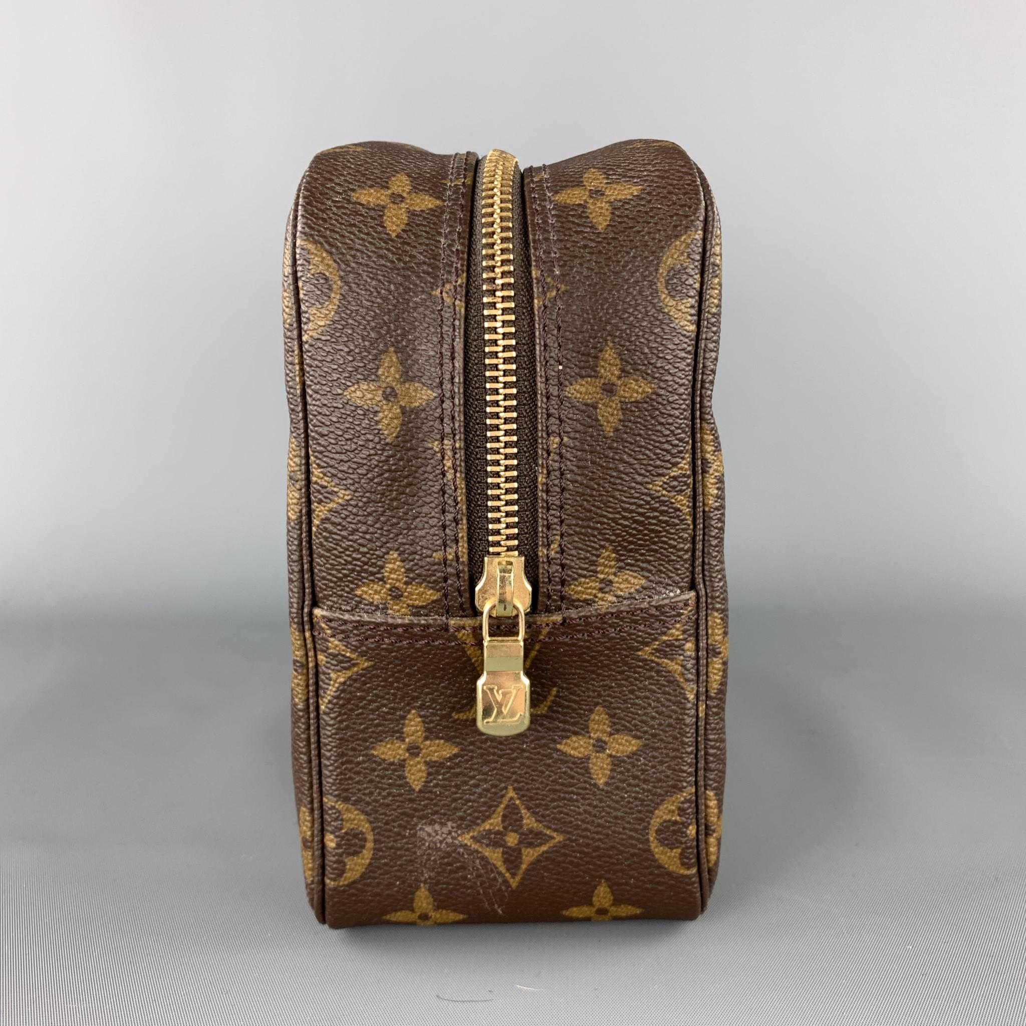 Vintage LOUIS VUITTON toiletries bag coms in classic brown monogram coated canvas with a top zip and beige interior. Wear throughout. As-is. Made in France.

Good Pre-Owned Condition.

Measurements:

Length: 11 in.
Width: 4 in.
Height: 7 in. 
SKU: