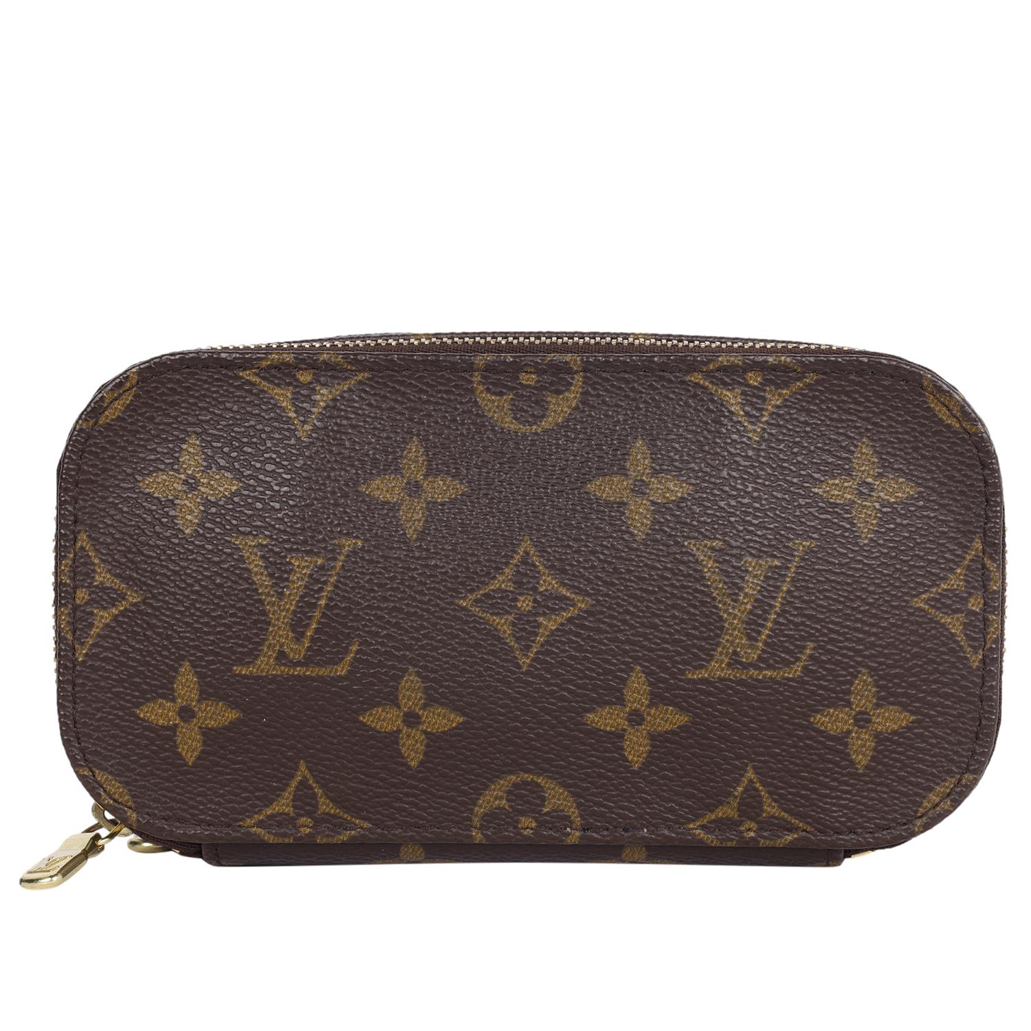 Authentic Louis Vuitton brown monogram Trousse blush PM cosmetic case. Features monogram canvas with 2 zipper sides, one with 3 stretch bands, a stretch side pocket and the other zippered side includes 4 rounded stretch bands. Great case to organize