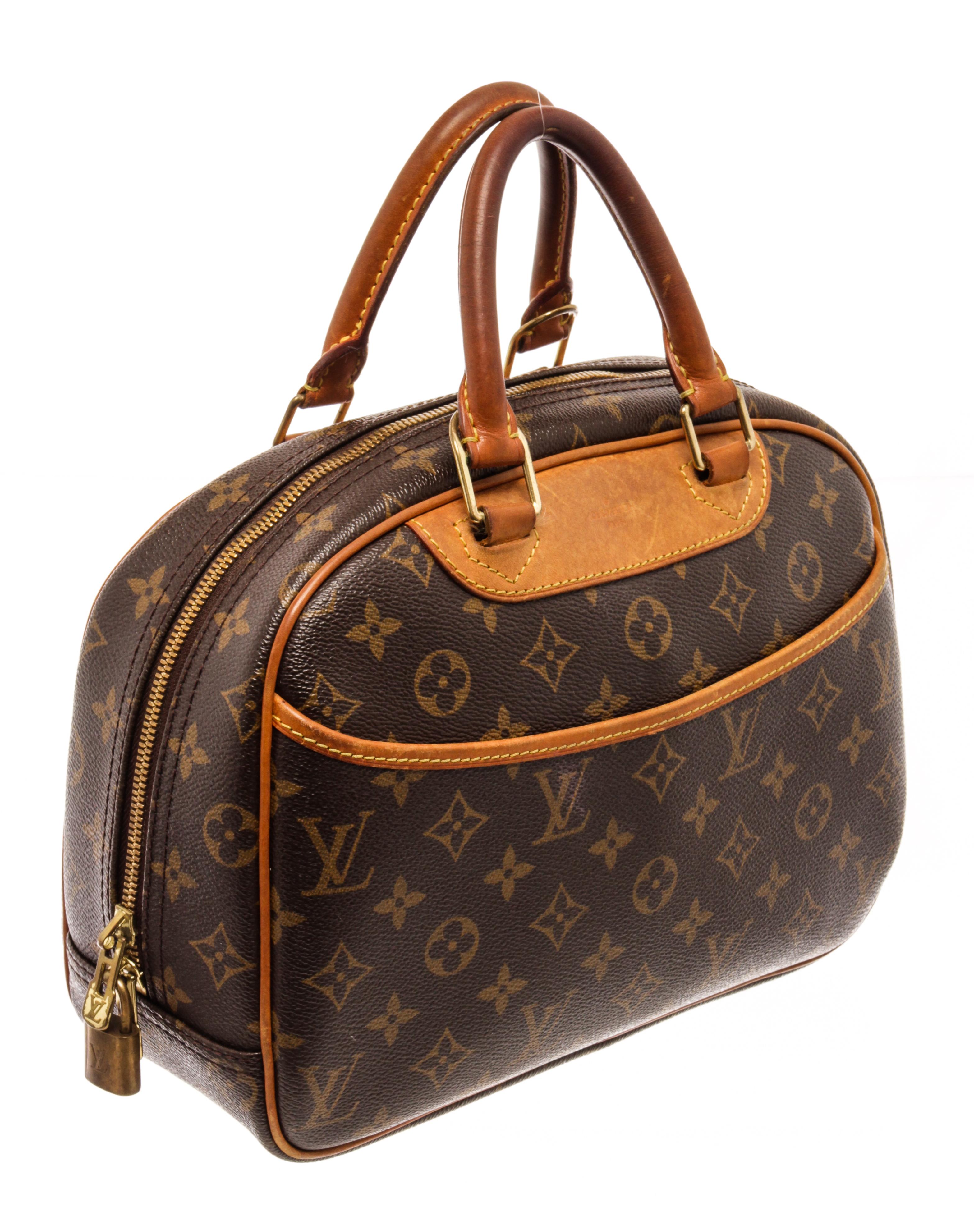 Louis Vuitton Brown Monogram Canvas Trouville Satchel Bag with leather, signature monogram canvas, rectangle body,, gold-tone hardware two-way zip fastening, two rounded top handles, front patch pocket, internal patch pockets, internal logo patch,
