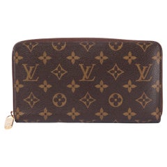 LOUIS VUITTON brown Monogram Canvas ZIPPY Wallet