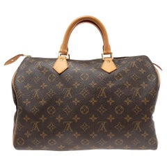 Used Louis Vuitton Brown Monogram Coated Canvas And Leather Speedy 35 Bag