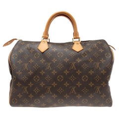 Louis Vuitton Brown Monogram Coated Canvas And Leather Speedy 35 Bag