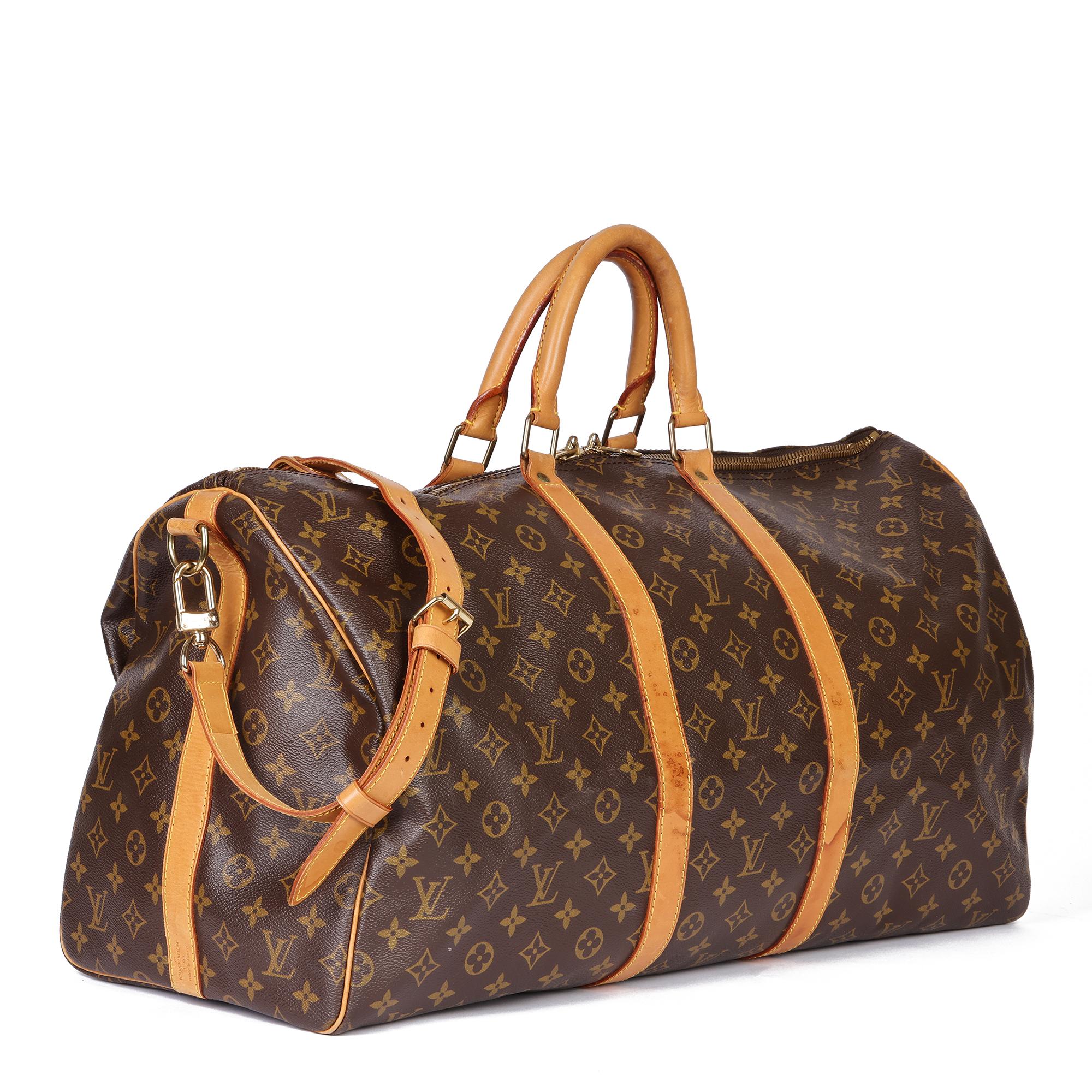 LOUIS VUITTON
Brown Monogram Coated Canvas and Vachetta Leather Vintage Keepall 55 Bandoulière 

Serial Number: TH1915
Age (Circa): 1995
Accompanied By: Shoulder Strap
Authenticity Details: Date Stamp (Made in France)
Gender: Ladies
Type: