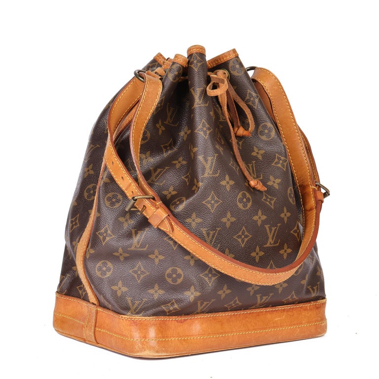 LOUIS VUITTON
Brown Monogram Coated Canvas and Vachetta Leather Vintage Petit Noé

Serial Number: AR0930
Age (Circa): 1990
Authenticity Details: Date Stamp (Made in France)
Gender: Ladies
Type: Shoulder

Colour: Brown
Hardware: Golden