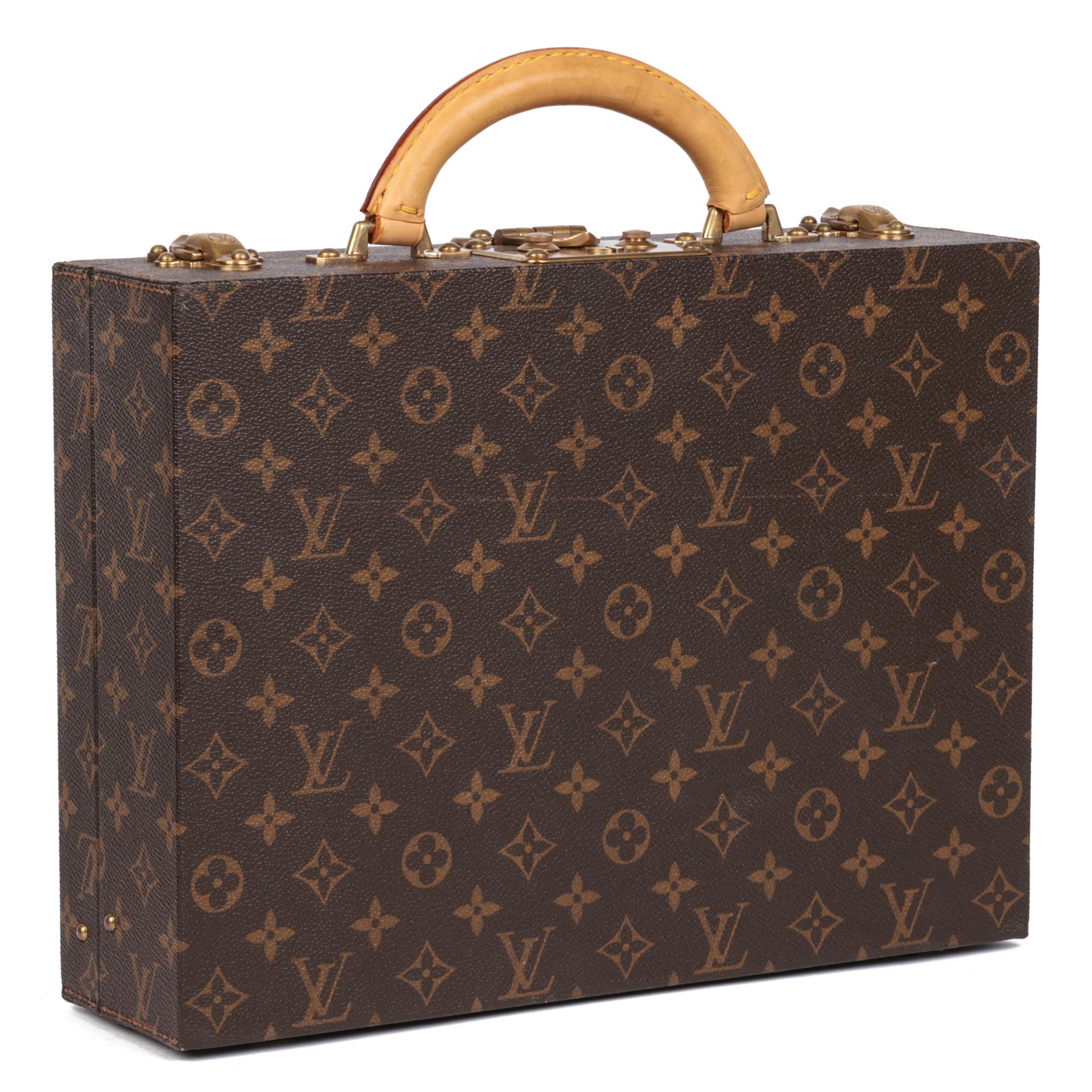 Louis Vuitton Brown Monogram Coated Canvas Jewellery Case

Product Details
The exterior is in good condition with light signs of wear throughout, with scratches on the leather parts.
The interior is in very good condition with light signs of