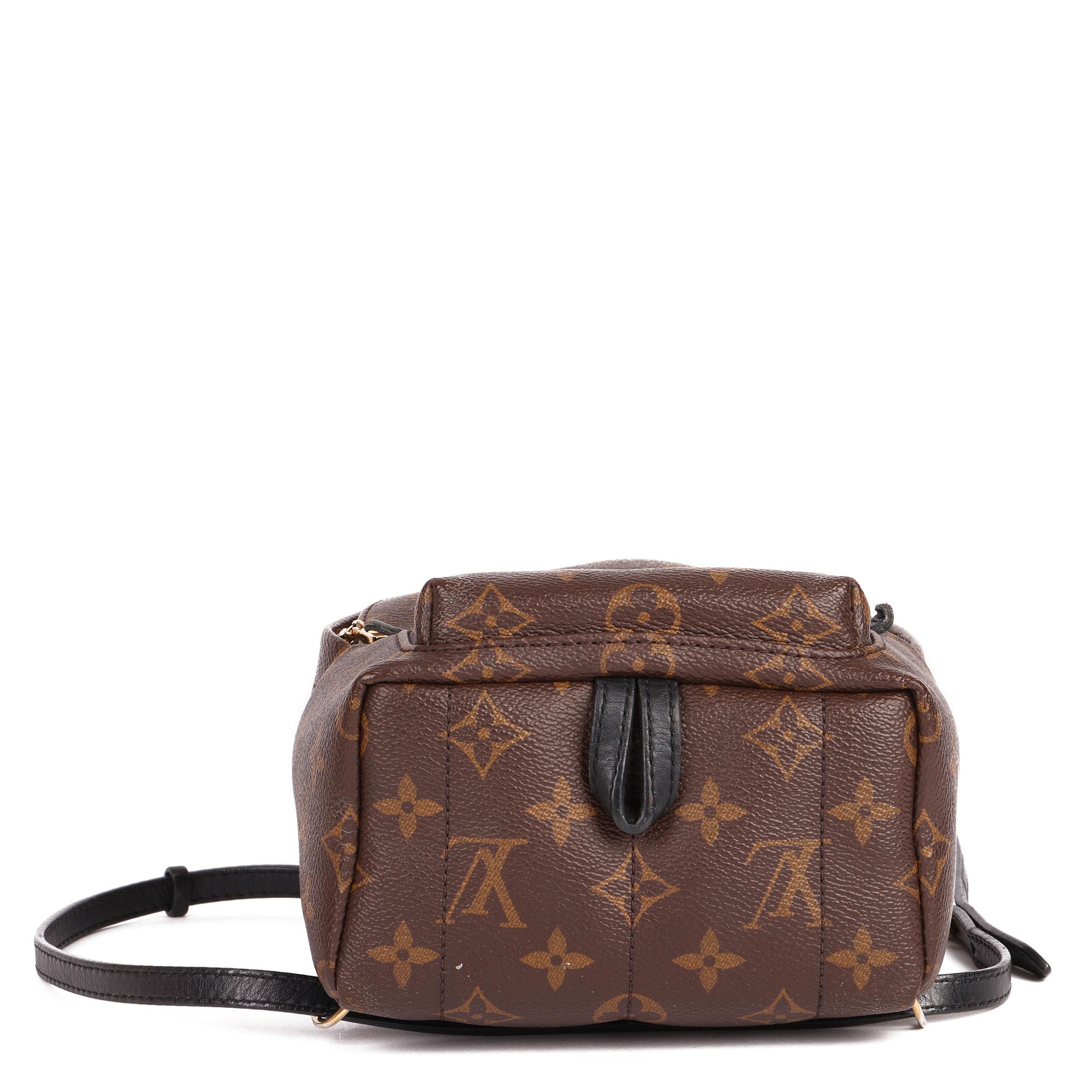LOUIS VUITTON
Brown Monogram Coated Canvas & Black Calfskin Leather Mini Palm Springs Backpack

Xupes Reference: CB430
Serial Number: SD5116
Age (Circa): 2016
Authenticity Details: Date Stamp (Made in USA)
Gender: Ladies
Type: Backpack, Shoulder,