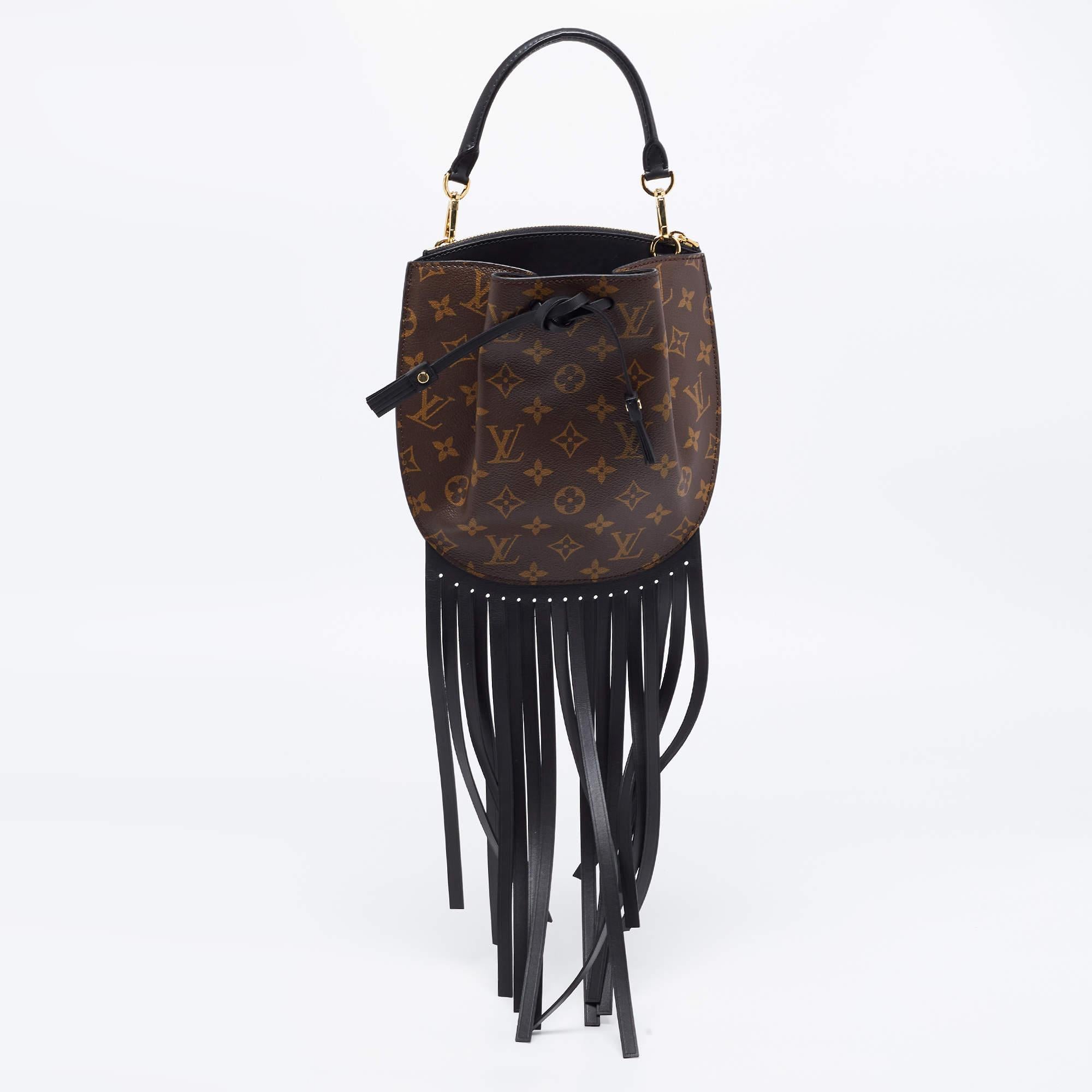Perfect for conveniently housing your essentials in one place, this Louis Vuitton Noe Fringe bag is a worthy investment. It has notable details and offers a look of luxury.

Includes: Original Dustbag

