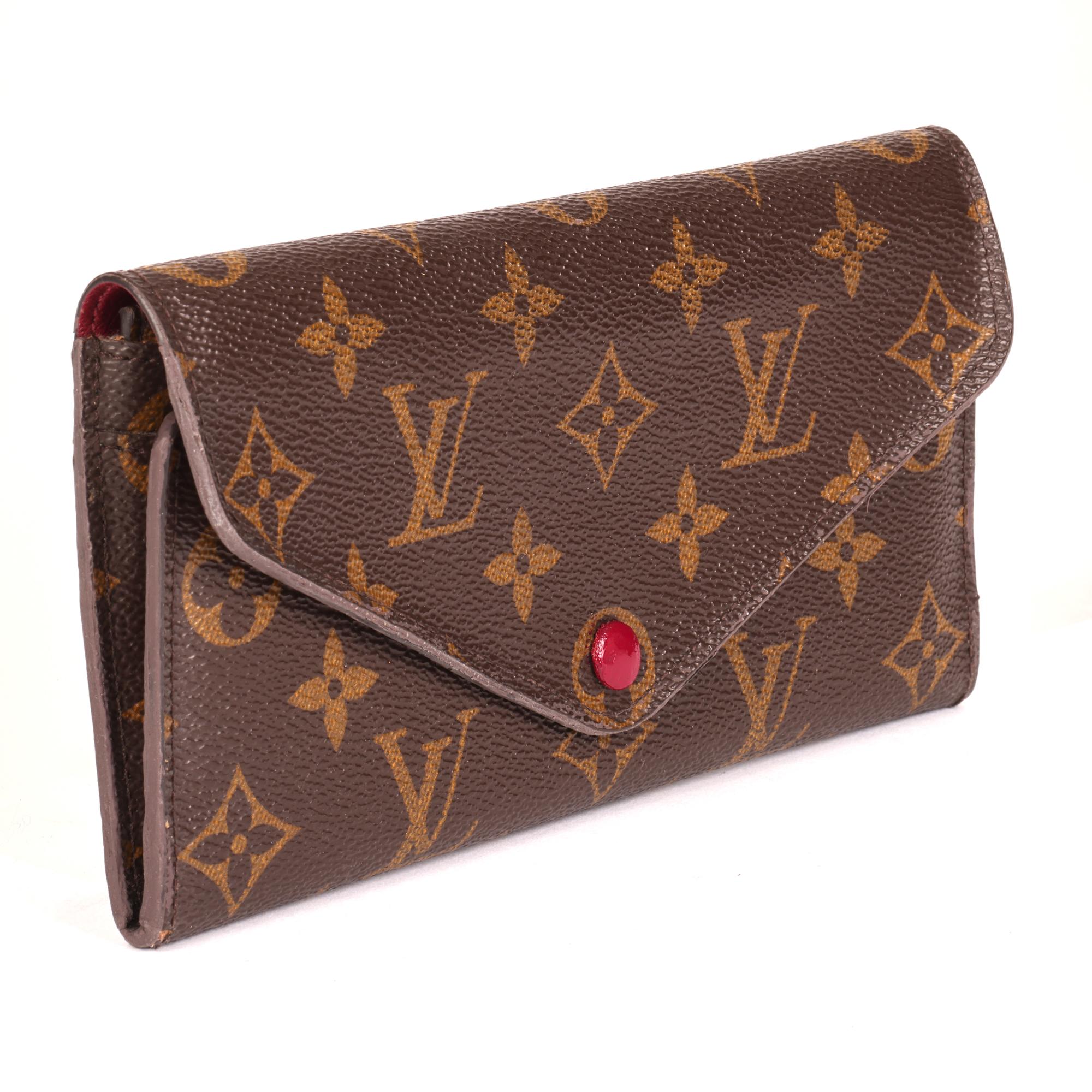 Louis Vuitton BROWN MONOGRAM COATED CANVAS SARAH WALLET

CONDITION NOTES
The exterior is in very good condition with light signs of use.
The interior is in very good condition with light signs of use.
The hardware is in very good condition with