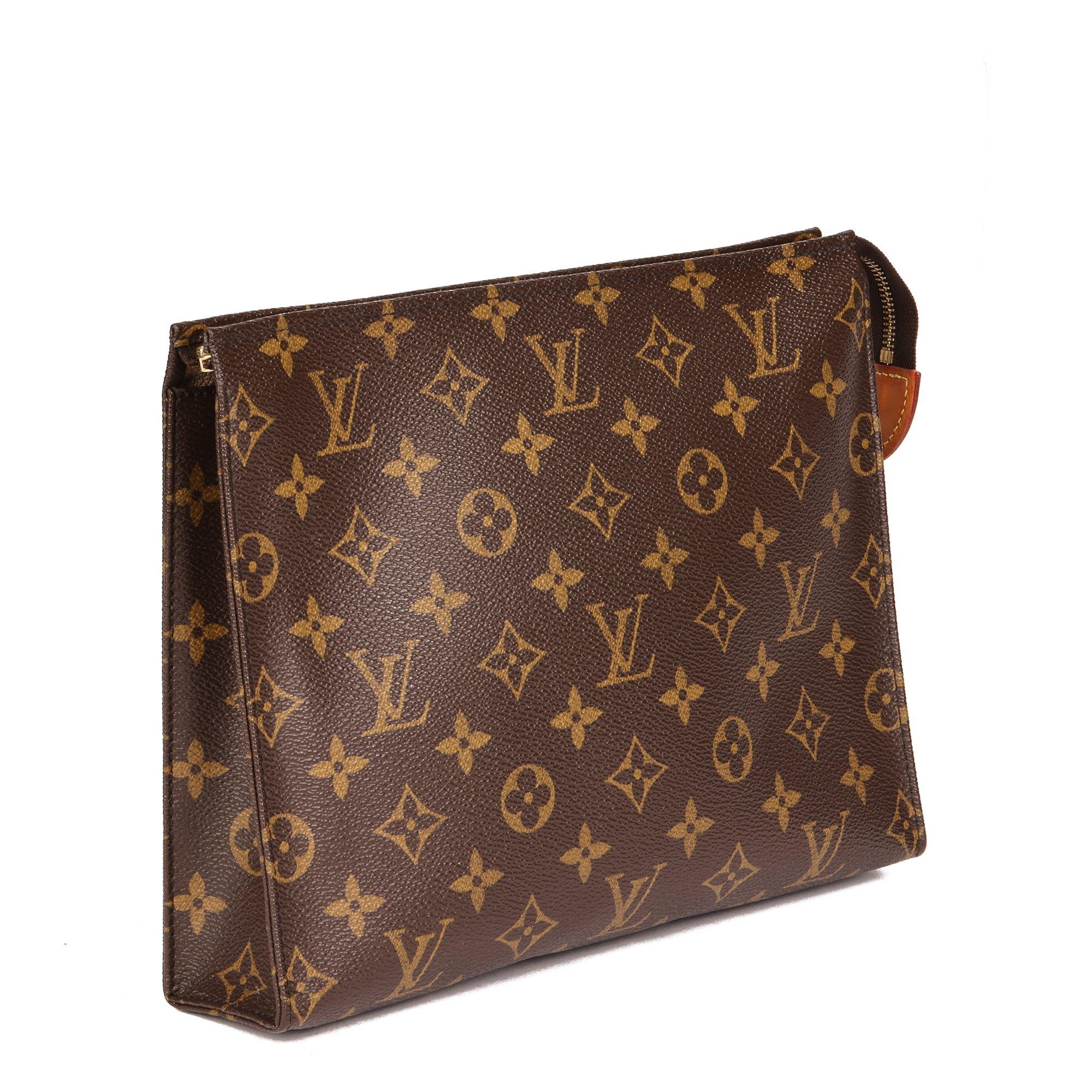 Louis Vuitton BROWN MONOGRAM COATED CANVAS TOILETRY POUCH 26

CONDITION NOTES
The exterior is in excellent condition with light signs of use.
The interior is in excellent condition with light signs of use.
The hardware is in excellent condition with