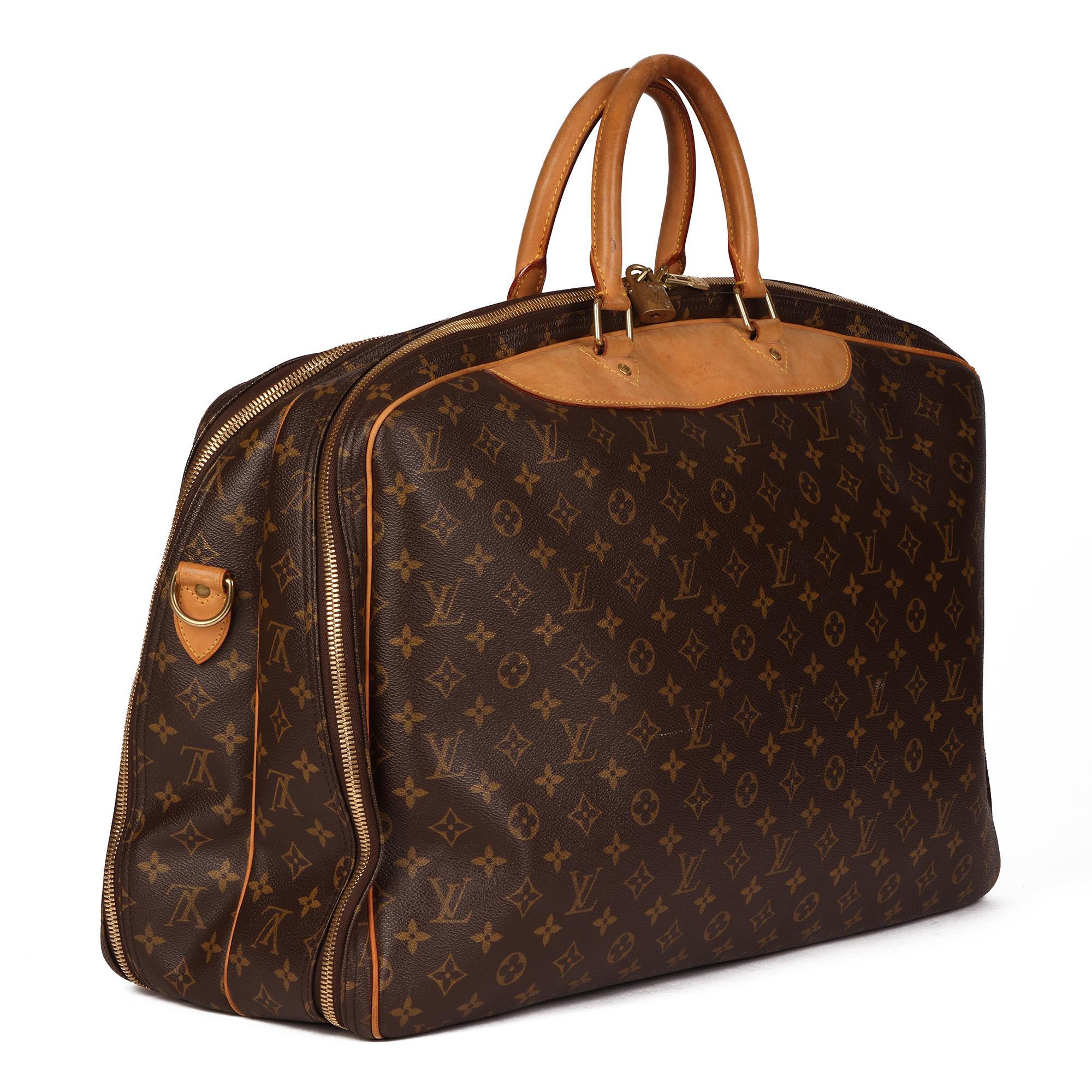 LOUIS VUITTON
Brown Monogram Coated Canvas & Vachetta Leather Alize 48 Hours

Xupes Reference: CB544
Serial Number: MB0026
Age (Circa): 2006
Accompanied By: Two Padlocks
Authenticity Details: Date Stamp (Made in France) 
Gender: Ladies
Type: