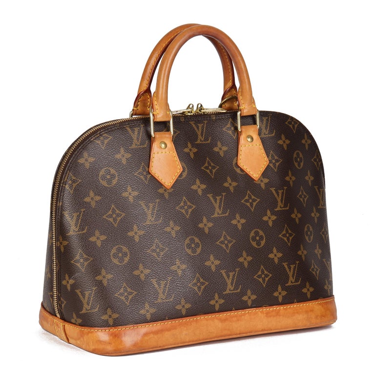 LOUIS VUITTON
Brown Monogram Coated Canvas & Vachetta Leather Alma PM

Xupes Reference: CB633
Serial Number: BA0014
Age (Circa): 2004
Authenticity Details: Date Stamp (Made in France)
Gender: Ladies
Type: Tote

Colour: Brown
Hardware: Golden