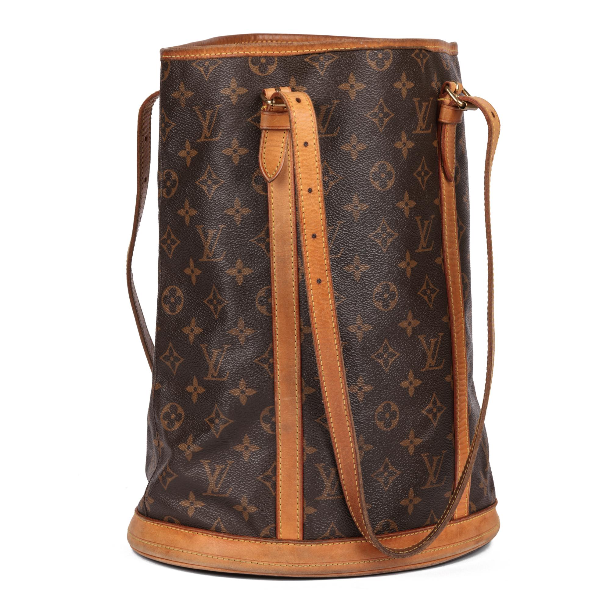 LOUIS VUITTON
Brown Monogram Coated Canvas & Vachetta Leather Bucket Bag

Serial Number: FL0086
Age (Circa): 2006
Authenticity Details: Date Stamp (Made in France)
Gender: Ladies
Type: Tote, Shoulder

Colour: Brown
Hardware: Golden