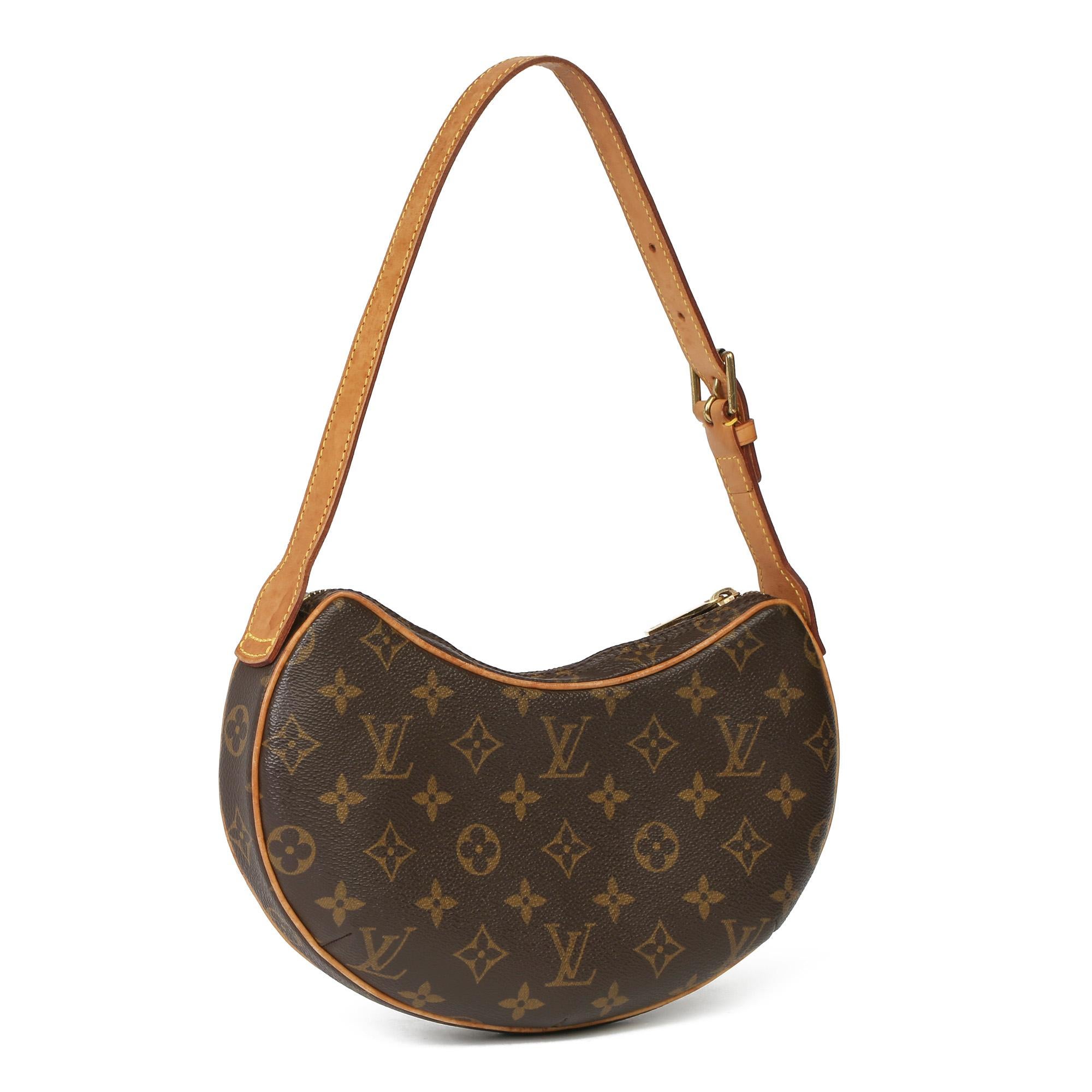 LOUIS VUITTON
Brown Monogram Coated Canvas & Vachetta Leather Croissant PM 

Xupes Reference: HB3947
Serial Number: SP1022
Age (Circa): 2002
Accompanied By: Louis Vuitton Dust Bag
Authenticity Details: Date Stamp (Made in France) 
Gender: