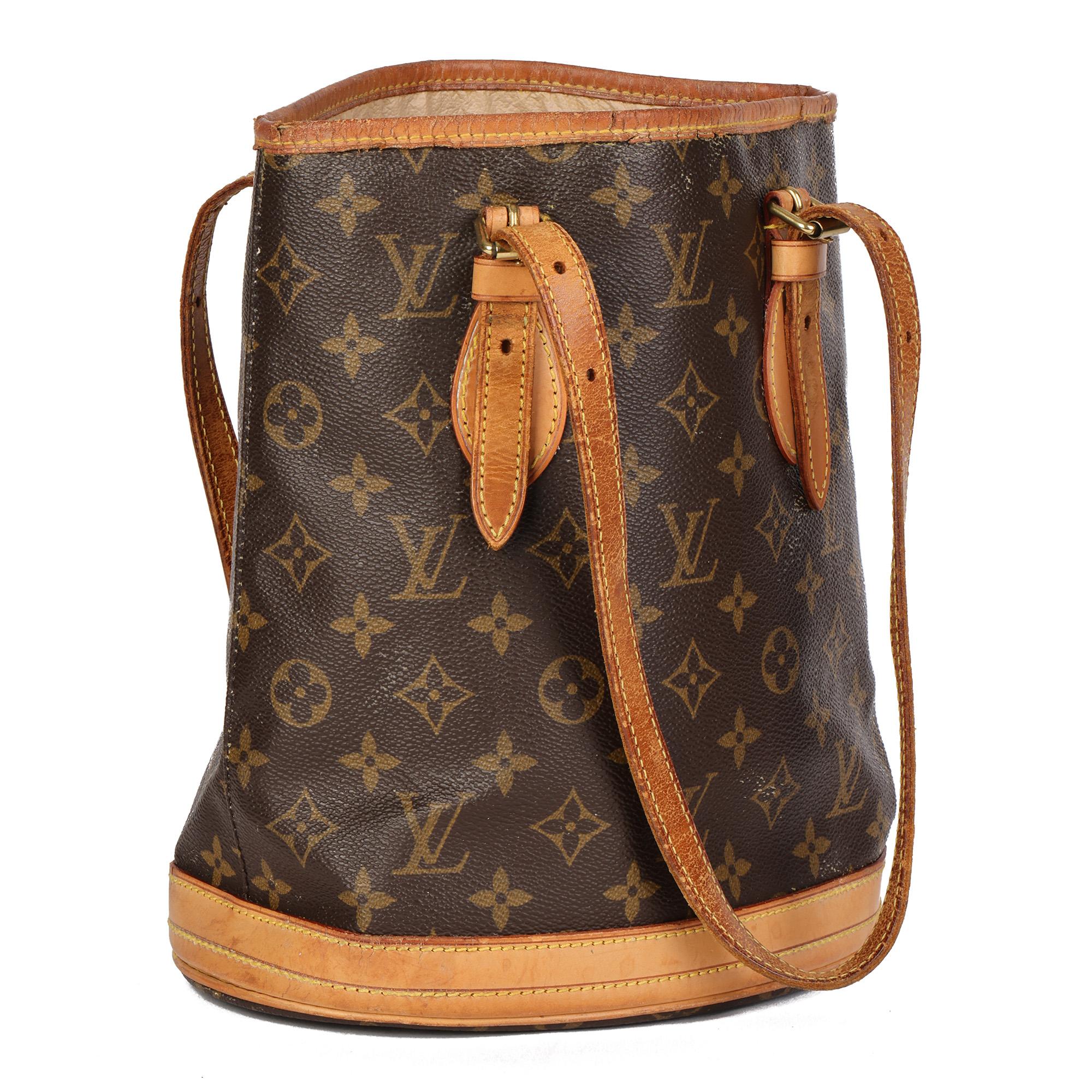 LOUIS VUITTON
Brown Monogram Coated Canvas & Vachetta Leather Vintage Bucket Bag PM

Serial Number: FL0031
Age (Circa): 2001
Authenticity Details: Date Stamp (Made in France)
Gender: Ladies
Type: Shoulder, Tote

Colour: Brown
Hardware: Golden