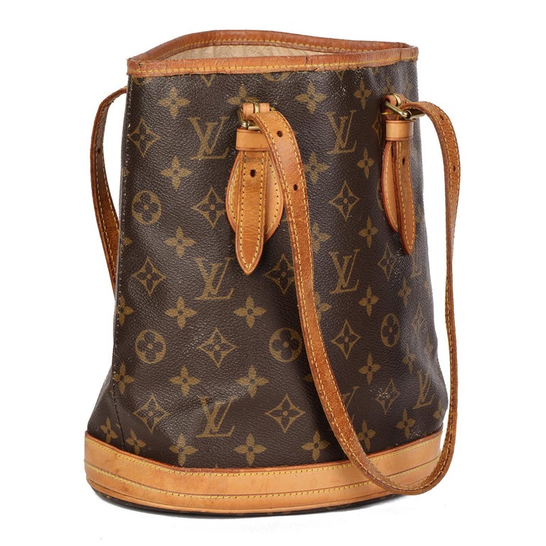 LOUIS VUITTON
Brown Monogram Coated Canvas & Vachetta Leather Vintage Bucket Bag PM

Xupes Reference: CB660
Serial Number: FL0031
Age (Circa): 2001
Authenticity Details: Date Stamp (Made in France)
Gender: Ladies
Type: Shoulder, Tote

Colour: