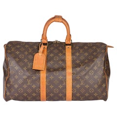 LOUIS VUITTON Brown Monogram Coated Canvas & Vachetta Leather Retro Keepall 45