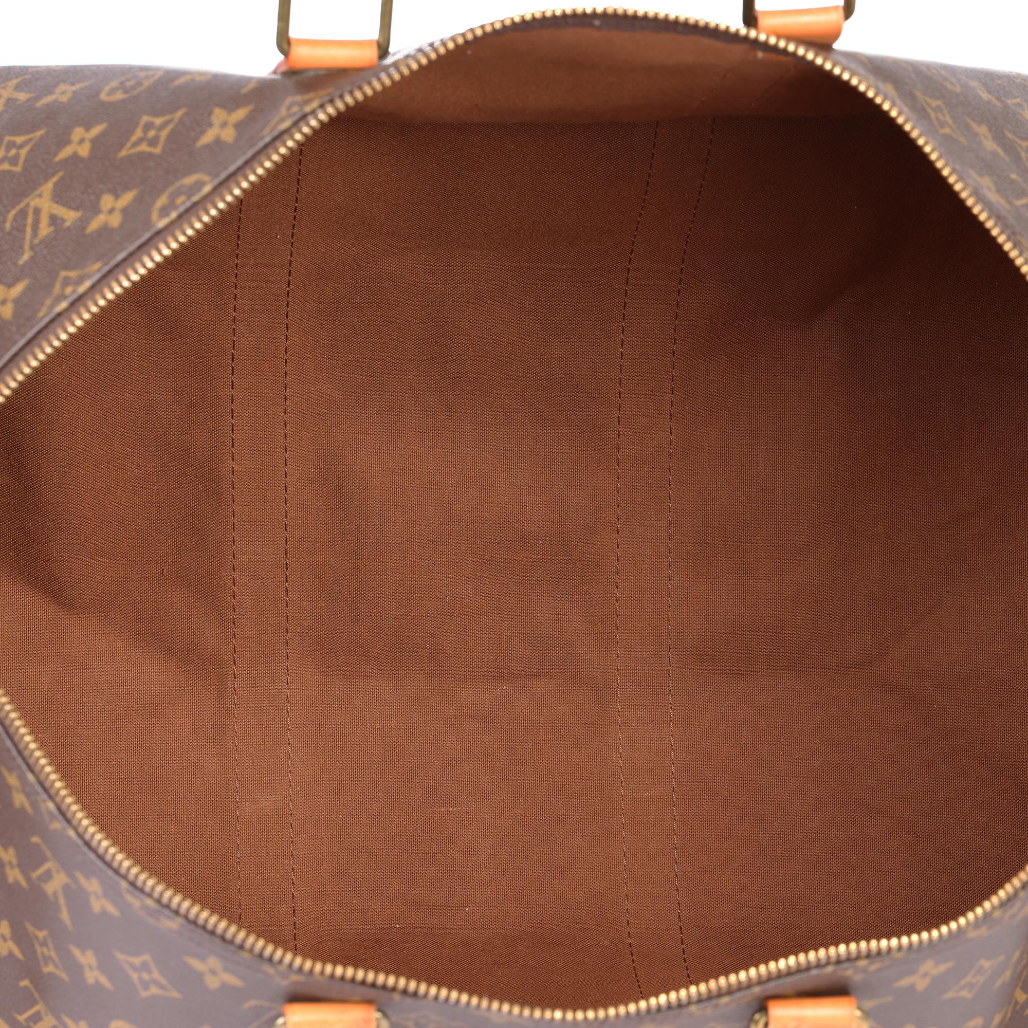 LOUIS VUITTON Brown Monogram Coated Canvas & Vachetta Leather Vintage Keepall 55 For Sale 7