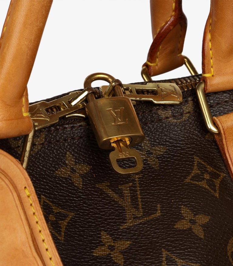 1996 Louis Vuitton Brown Monogram Coated Canvas and Vachetta Vintage Keepall  55 at 1stDibs