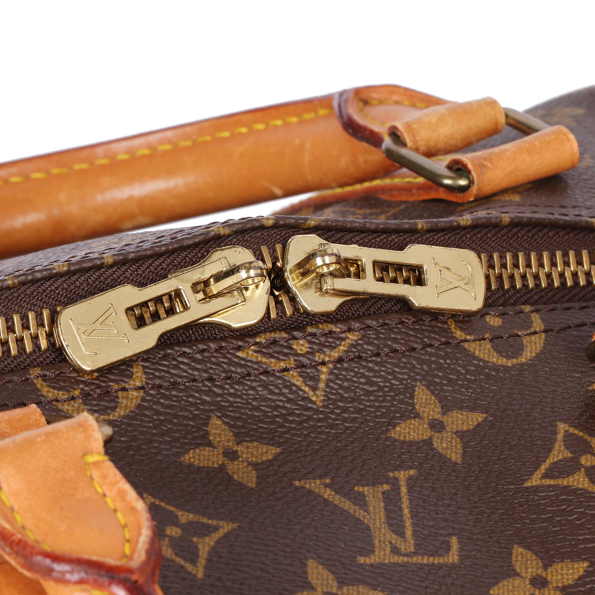 LOUIS VUITTON Brown Monogram Coated Canvas & Vachetta Leather Vintage Keepall 55 For Sale 3