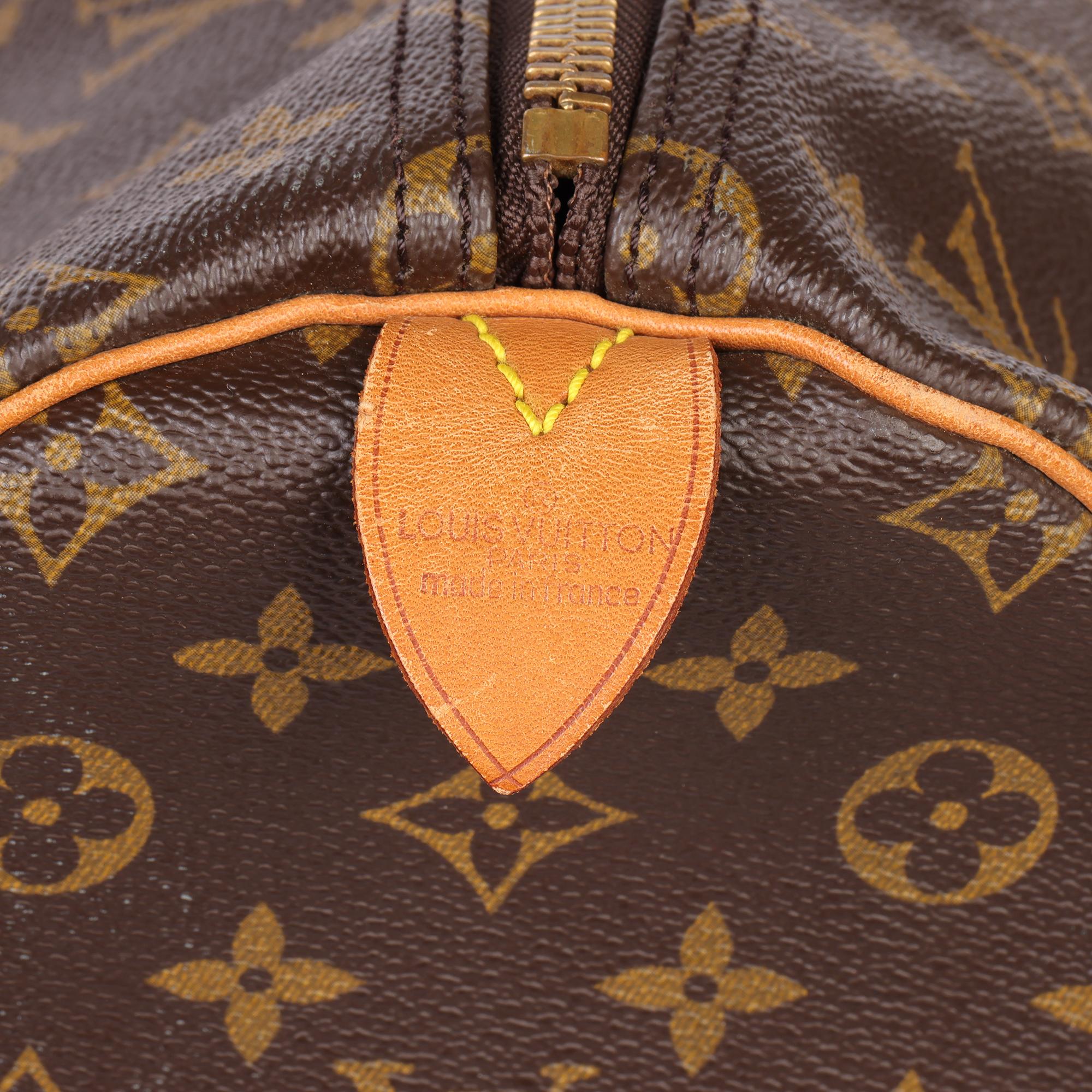 LOUIS VUITTON Brown Monogram Coated Canvas & Vachetta Leather Vintage Keepall 55 For Sale 5