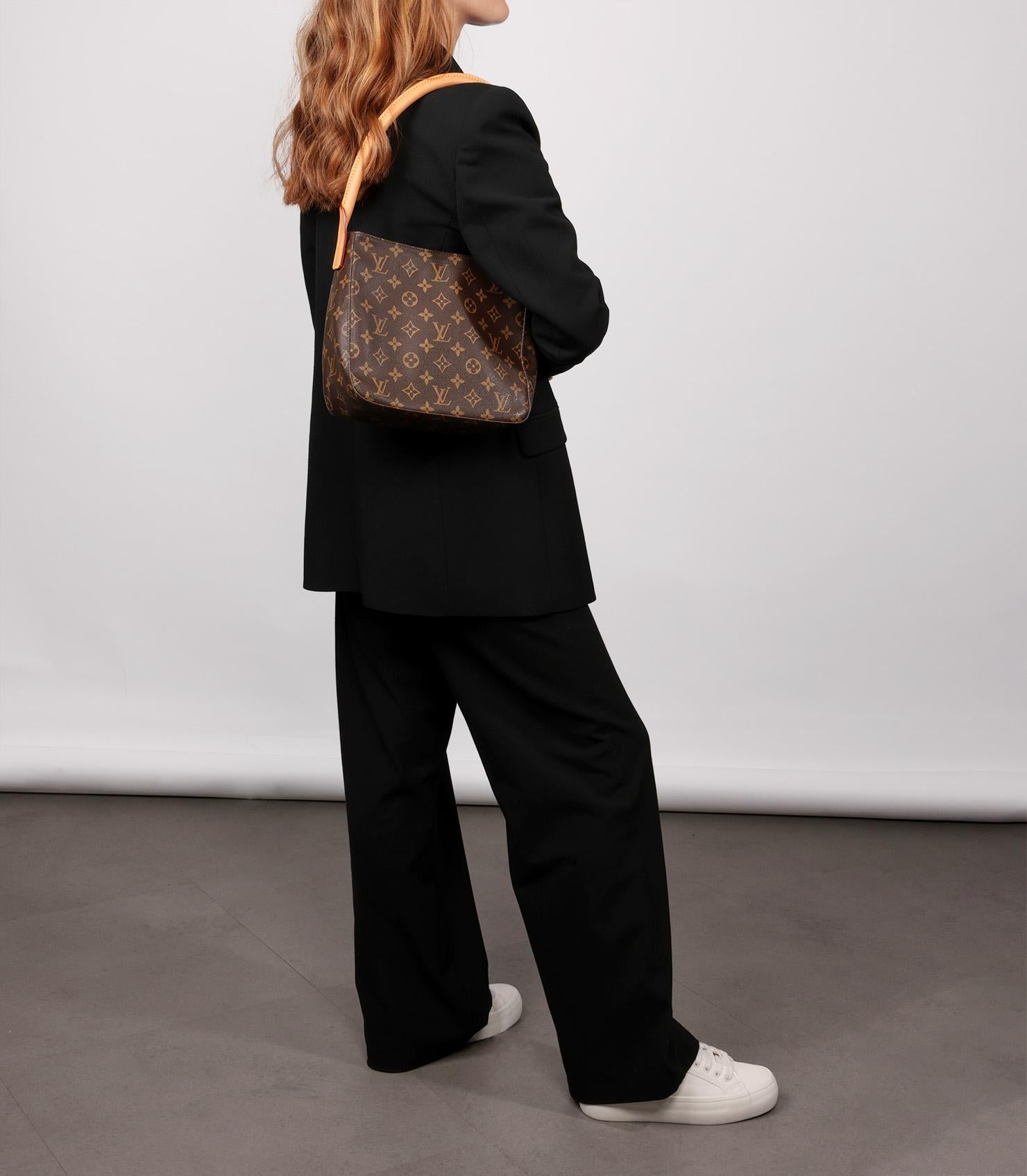 Louis Vuitton Brown Monogram Coated Canvas & Vachetta Leather Vintage Looping MM

Product Details
Xupes Ref: HB5696
Brand: Louis Vuitton
Model: Looping MM
Type: Shoulder, Top Handle
Serial Number: FL0072
Age: 2002
Colour: Brown
Hardware: Golden