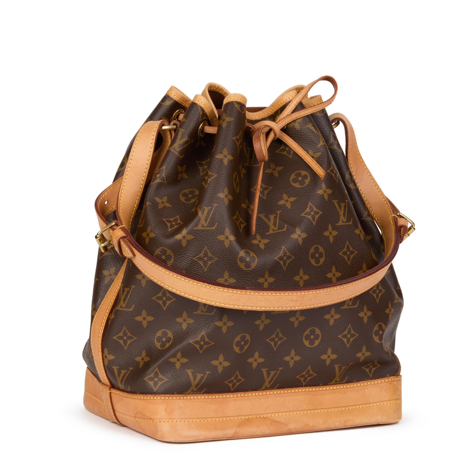 LOUIS VUITTON
Brown Monogram Coated Canvas & Vachetta Leather Vintage Noé

Xupes Reference: HB4458
Serial Number: AR0011
Age (Circa): 2001
Authenticity Details: Date Stamp (Made in France) 
Gender: Ladies
Type: Shoulder

Colour: Brown
Hardware: