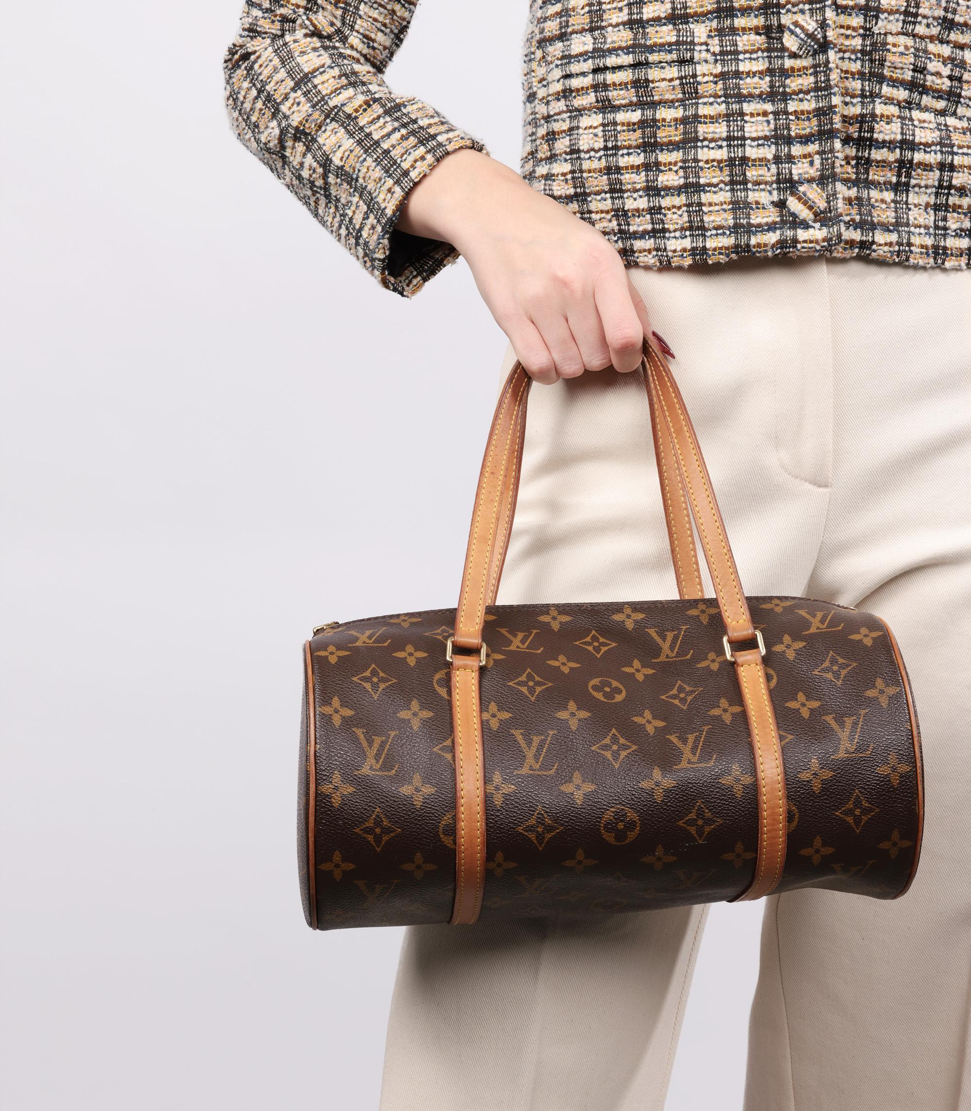 Louis Vuitton Brown Monogram Coated Canvas & Vachetta Leather Vintage Papillon 30

Brand- Louis Vuitton
Model- Papillon 30
Product Type- Tote
Serial Number- SP****
Age- Circa 2002
Colour- Brown
Hardware- Golden Brass
Material(s)- Coated Canvas,