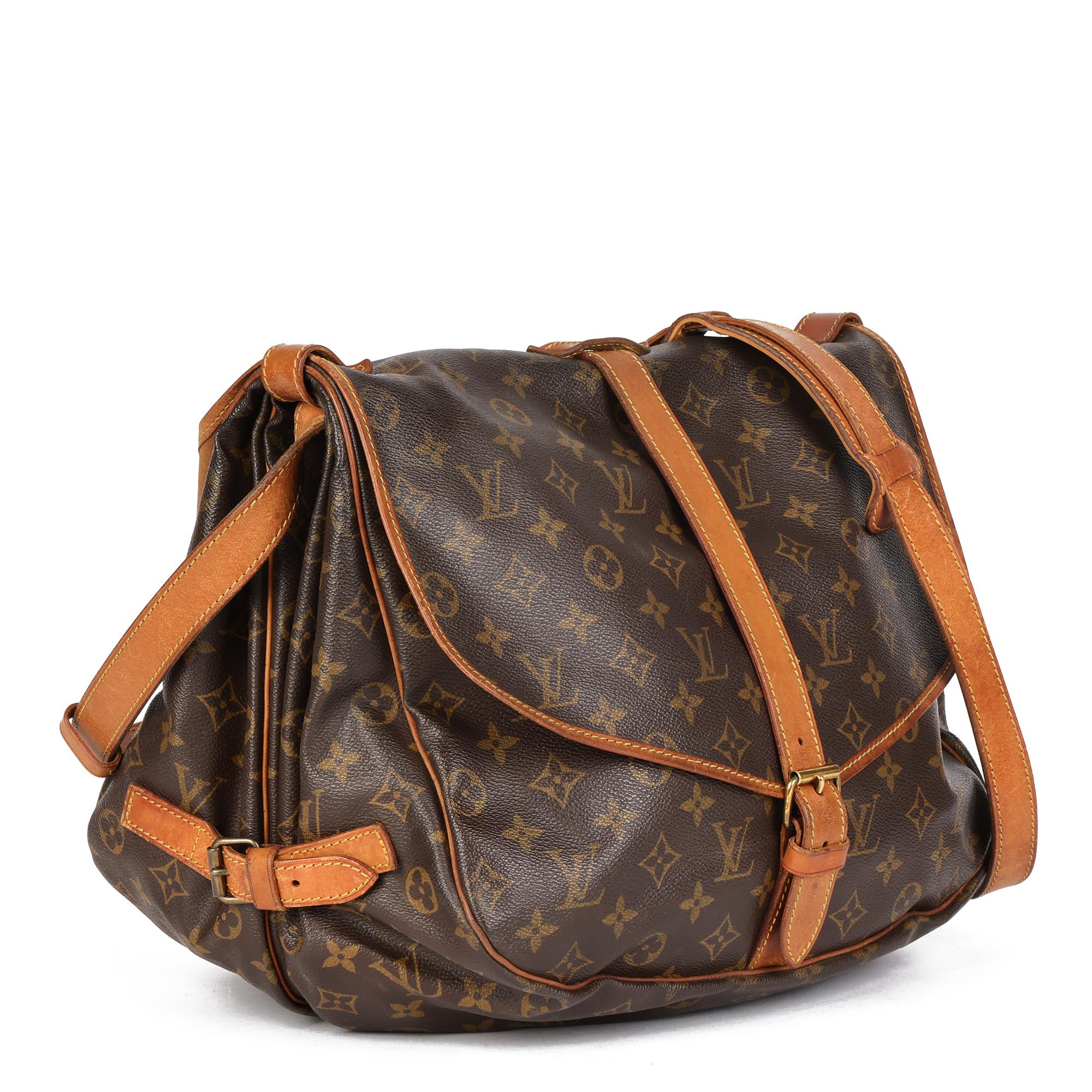 LOUIS VUITTON
Brown Monogram Coated Canvas & Vachetta Leather Vintage Saumur 35

Xupes Reference: CB626
Serial Number: VI8907
Age (Circa): 1997
Authenticity Details: Date Stamp (Made in France)
Gender: Unisex
Type: Crossbody, Shoulder

Colour:
