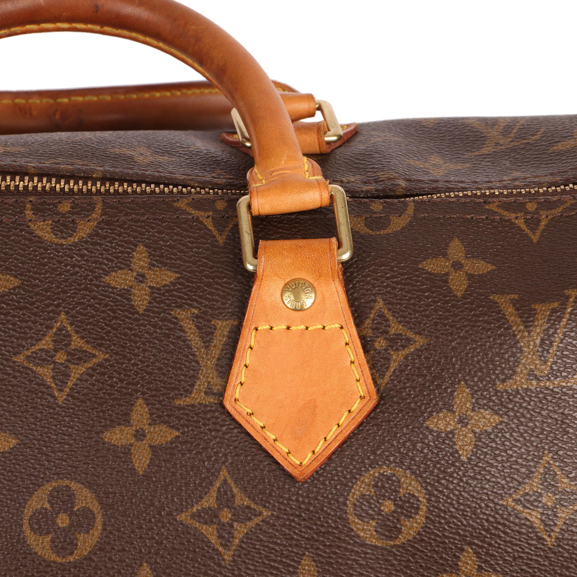 LOUIS VUITTON
Brown Monogram Coated Canvas & Vachetta Leather Vintage Speedy 35

Xupes Reference: CB439
Serial Number: MB0071
Age (Circa): 2001
Authenticity Details: Date Stamp (Made in France)
Gender: Ladies
Type: Tote

Colour: Brown
Hardware: