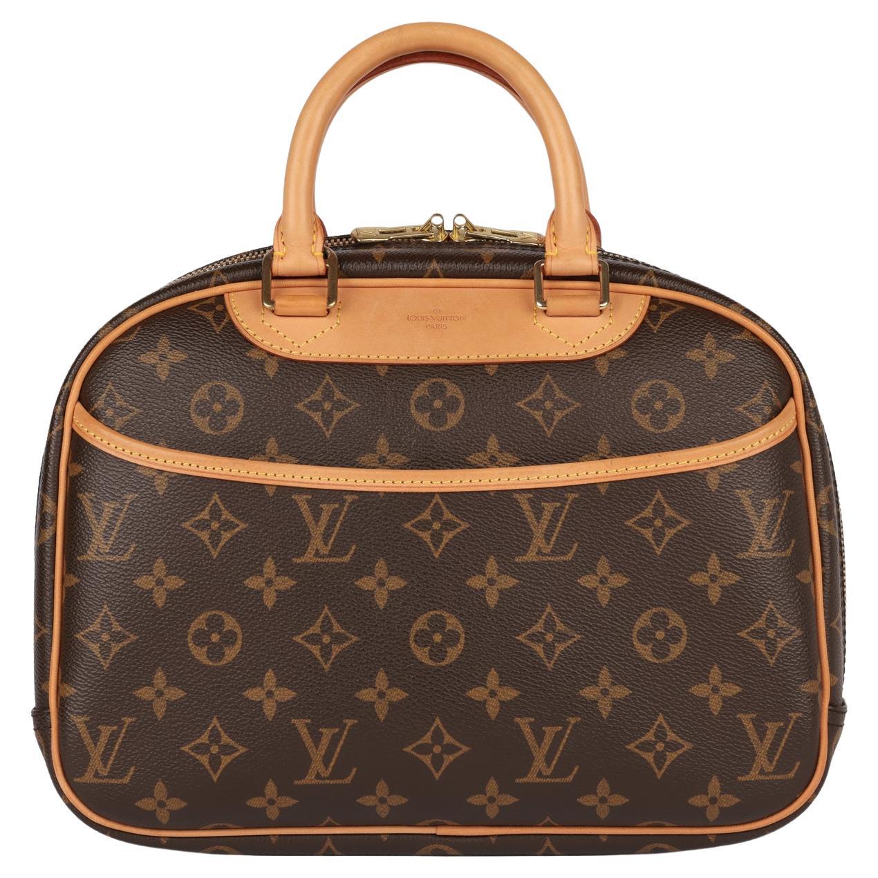 Louis Vuitton Brown Monogram Coated Canvas 
Vachetta Leather Vintage Trouville