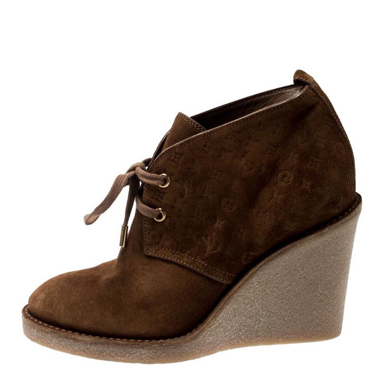 Louis Vuitton Brown Monogram Embossed Suede Leather Wedge Ankle Booties Size 37 For Sale at 1stdibs
