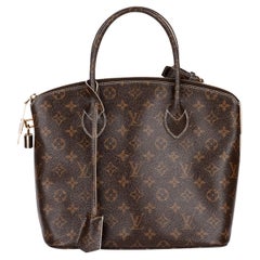 Louis Vuitton Brown Monogramm hochglänzendes beschichtetes Segeltuch Fetisch Lockit