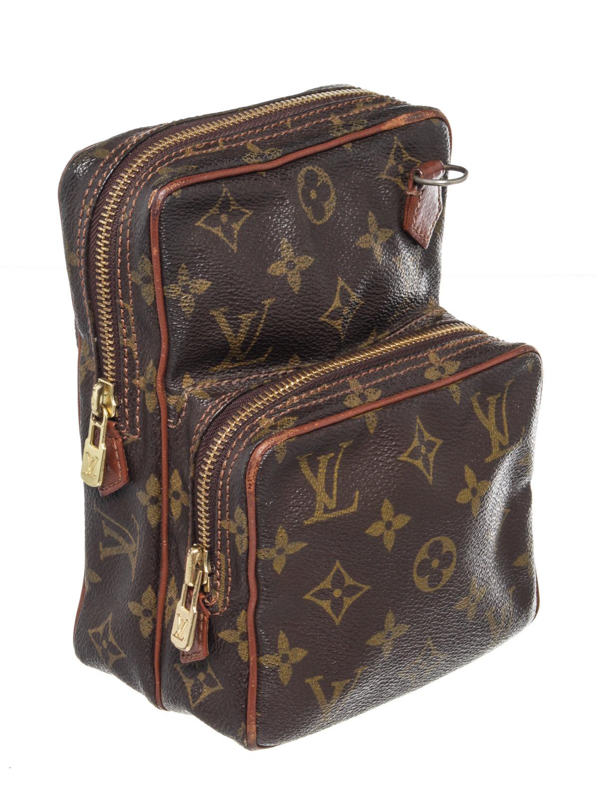 Louis Vuitton Brown Monogram Mini Amazon Shoulder Bag with monogram canvas, gold-tone hardware, trim tan vachetta leather, exterior zip pocket, shoulder strap and zipper closure.

58579MSC
