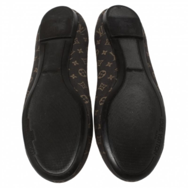 Personify elegance while flaunting these ballet flats. They are from Louis Vuitton and they feature round toes, LV metal cubes & bows on the uppers, and leather insoles. Crafted from signature Monogram canvas, these flats are a perfect fit for long