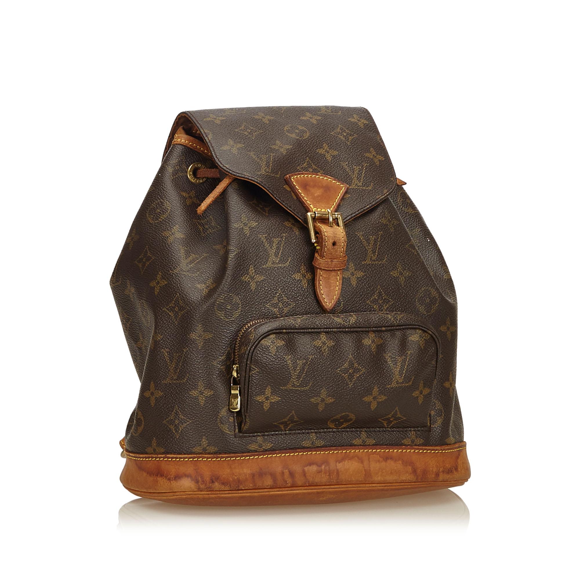The Mini Montsouris features a monogram canvas body, a front zip pocket, a front flap with a belt buckle detail, and a top drawstring closure.

It carries a B condition rating.

Dimensions: 
Length 24.00 cm
Width 21.00 cm
Depth 10.00 cm

Inclusions: