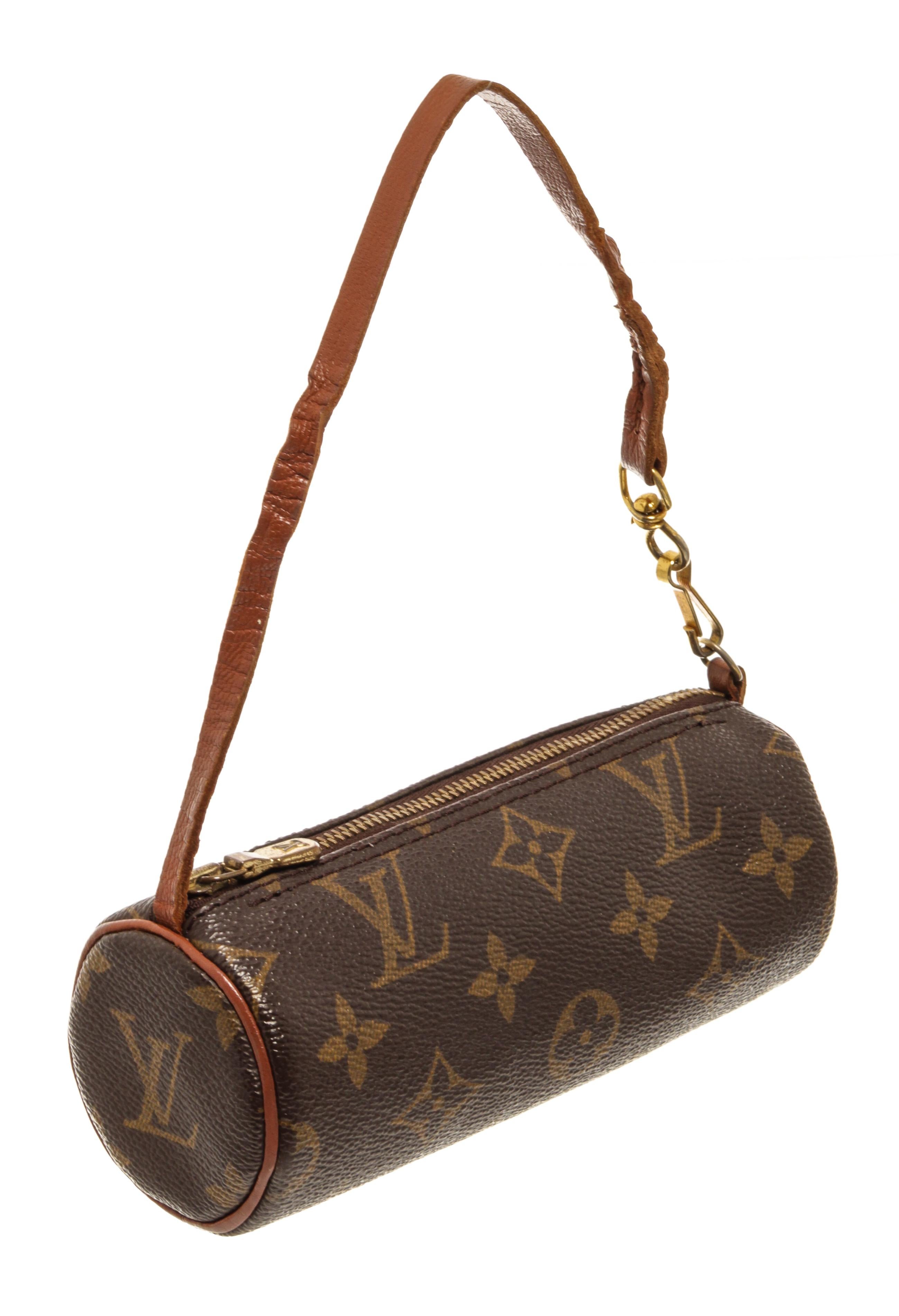 Louis Vuitton Brown Monogram Mini Papillon Shoulder Bag with material monogram  canvas gold-tone hardware, trim tan vachetta leather and zipper closure.

880136MSC