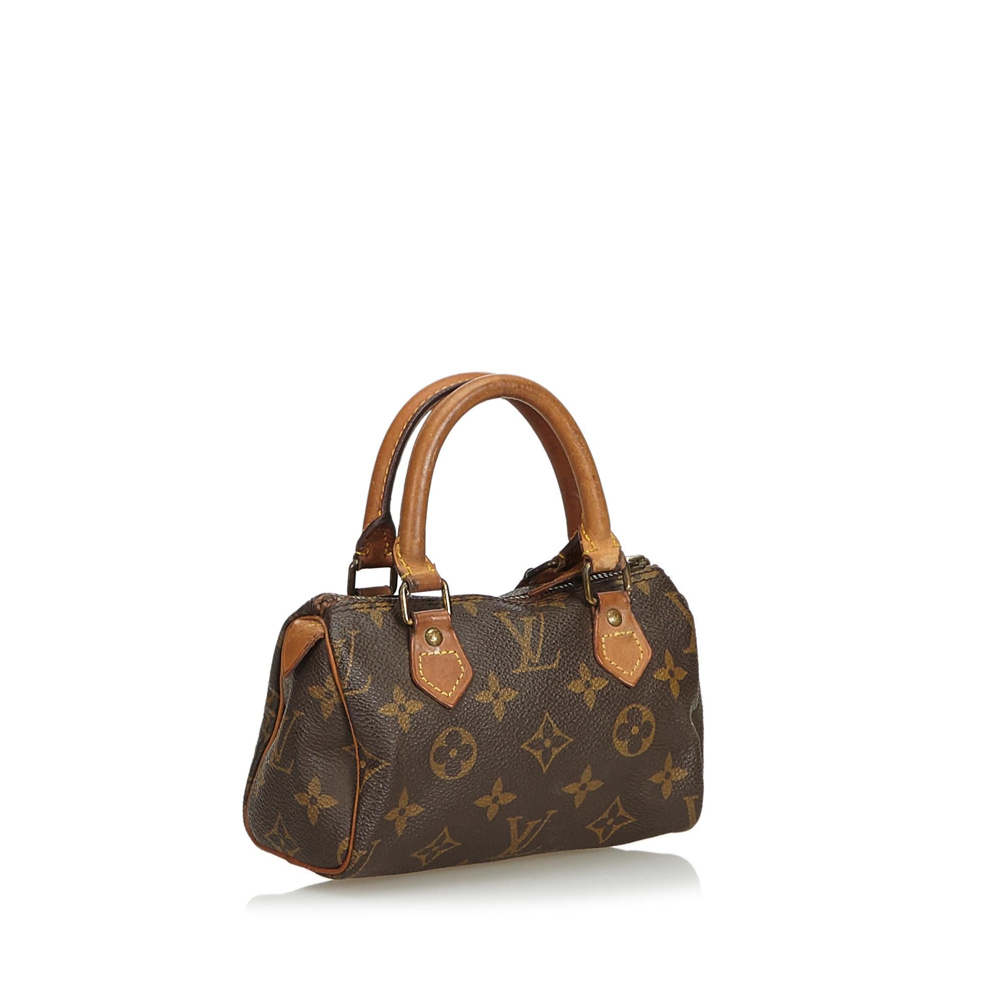 The Mini Speedy features a monogram canvas body, rolled leather handles, and a top zip closure. It carries as B condition rating.

Inclusions: 
This item does not come with inclusions.


Louis Vuitton pieces do not come with an authenticity