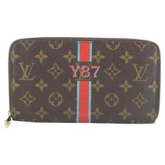 Louis Vuitton - Pochette portefeuille monogramme marron Monogram à fermeture éclair avec fermeture éclair autour