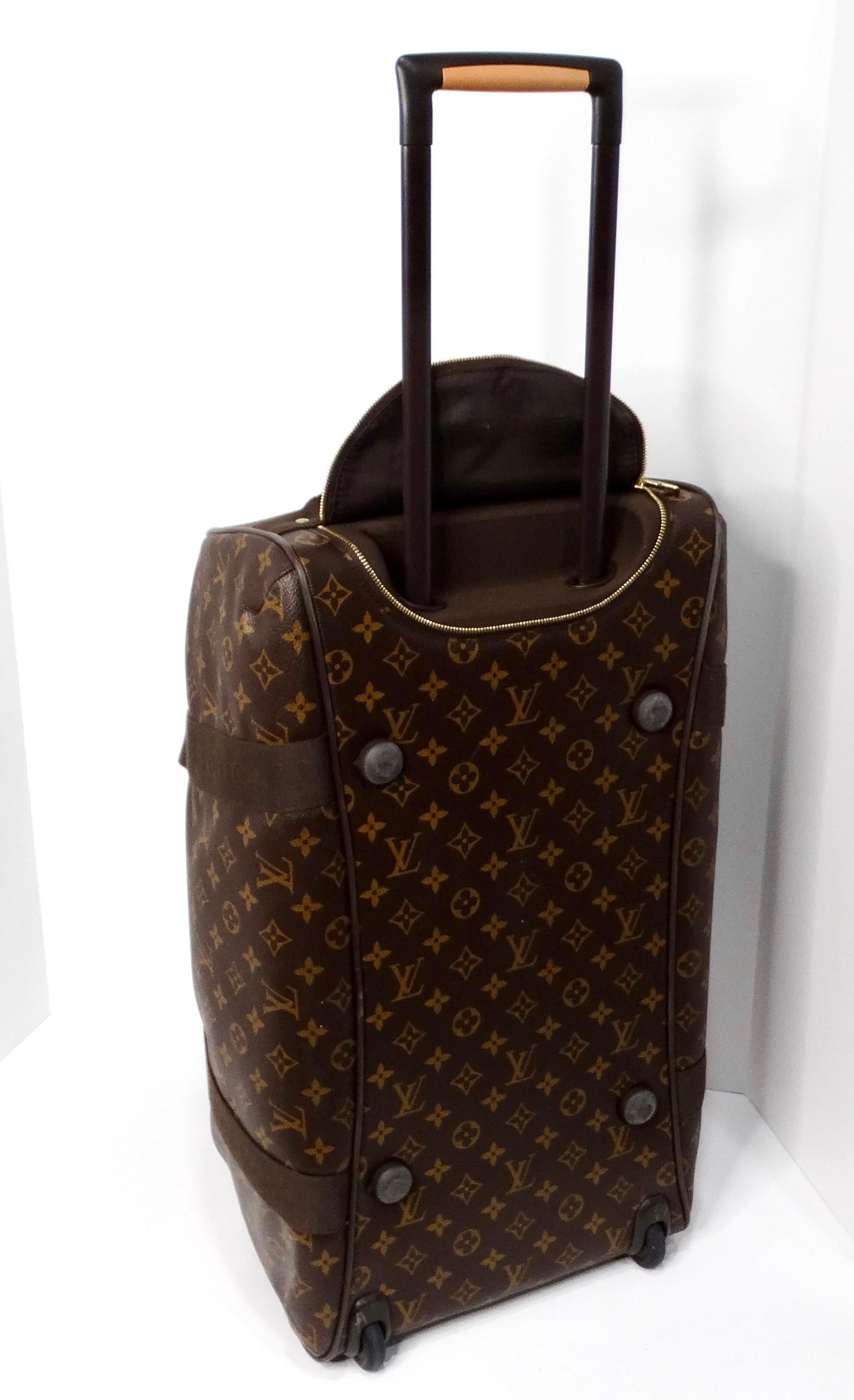 The Louis Vuitton Brown Monogram Neo Eole 55 Duffle Roller Suitcase seamlessly combines practicality and luxury, making it an essential travel companion. Crafted from iconic Monogram canvas, this suitcase is both stylish and durable, capturing the