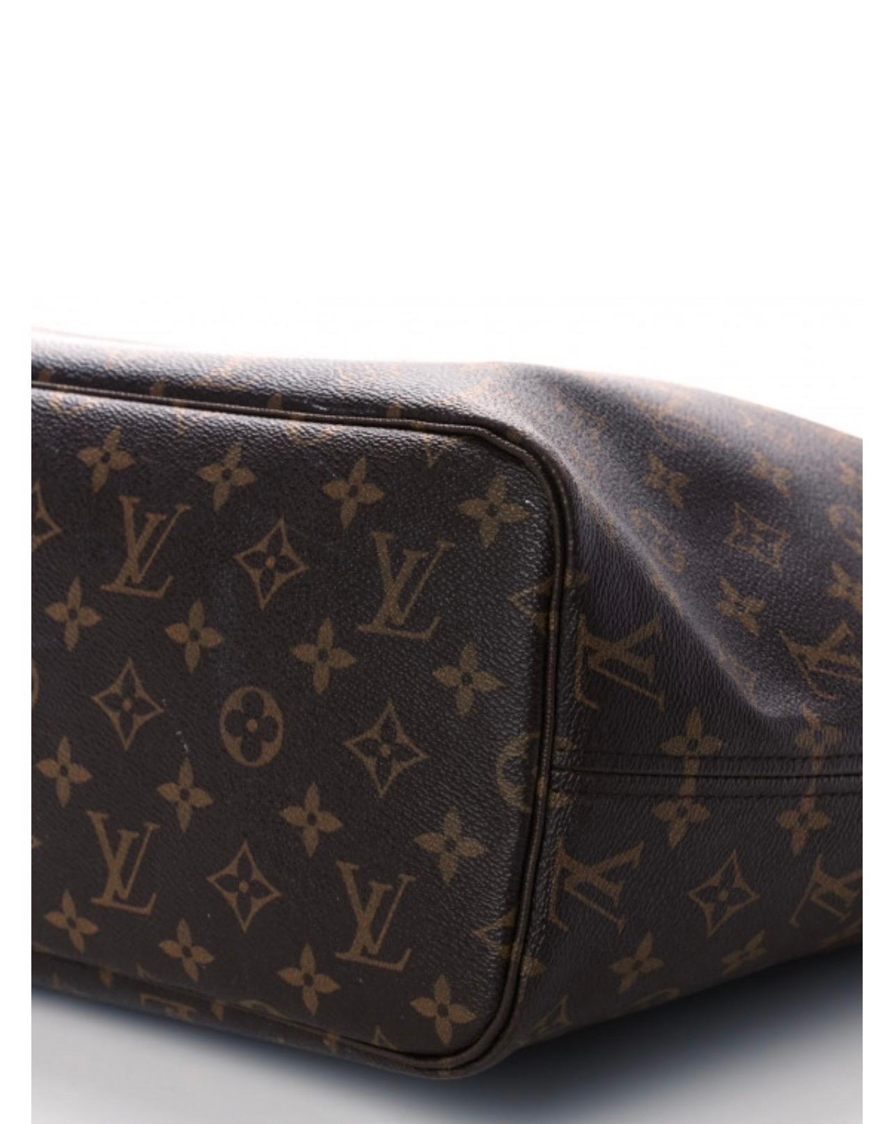 Brown and tan monogram coated canvas Louis Vuitton Neverfull MM with brass hardware, dual flat shoulder straps, tan Vachetta leather trim, drawstring accents at sides, tonal striped canvas lining, single zip pocket at interior wall and clasp closure