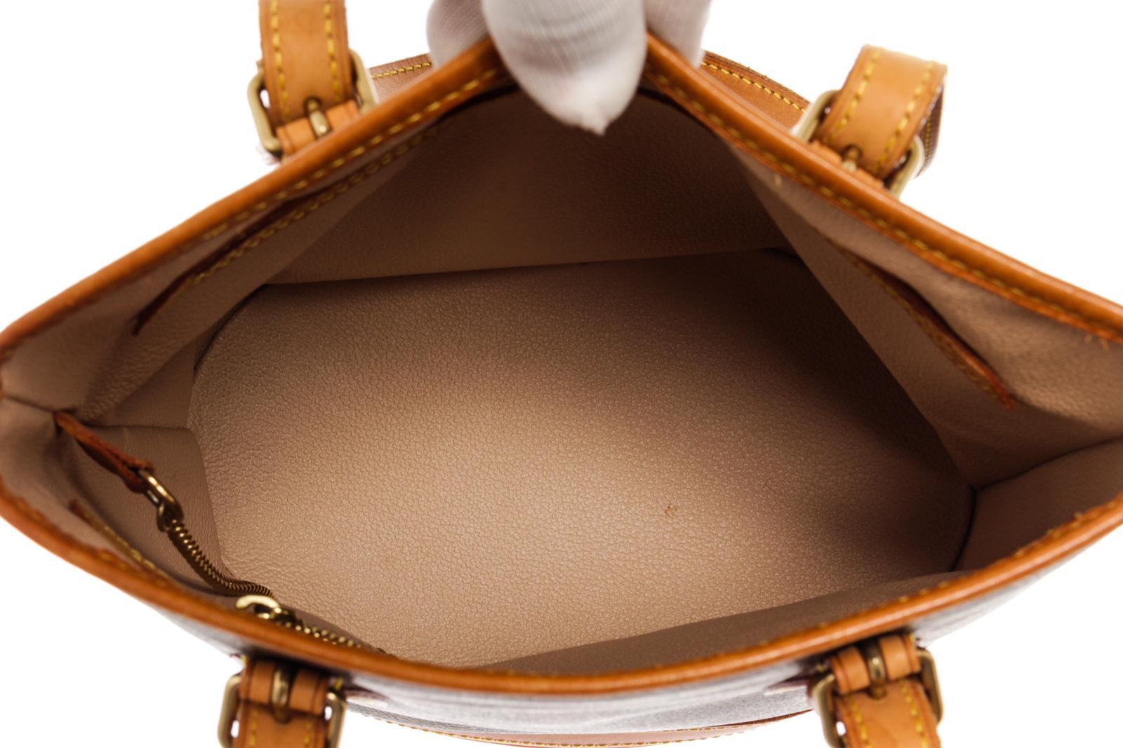 Louis Vuitton Brown Monogram PM Bucket Bag with monogram canvas, gold-tone hardware, trim tan vachetta leather, interior zip pocket, shoulder strap and flap closure.

60288MSC