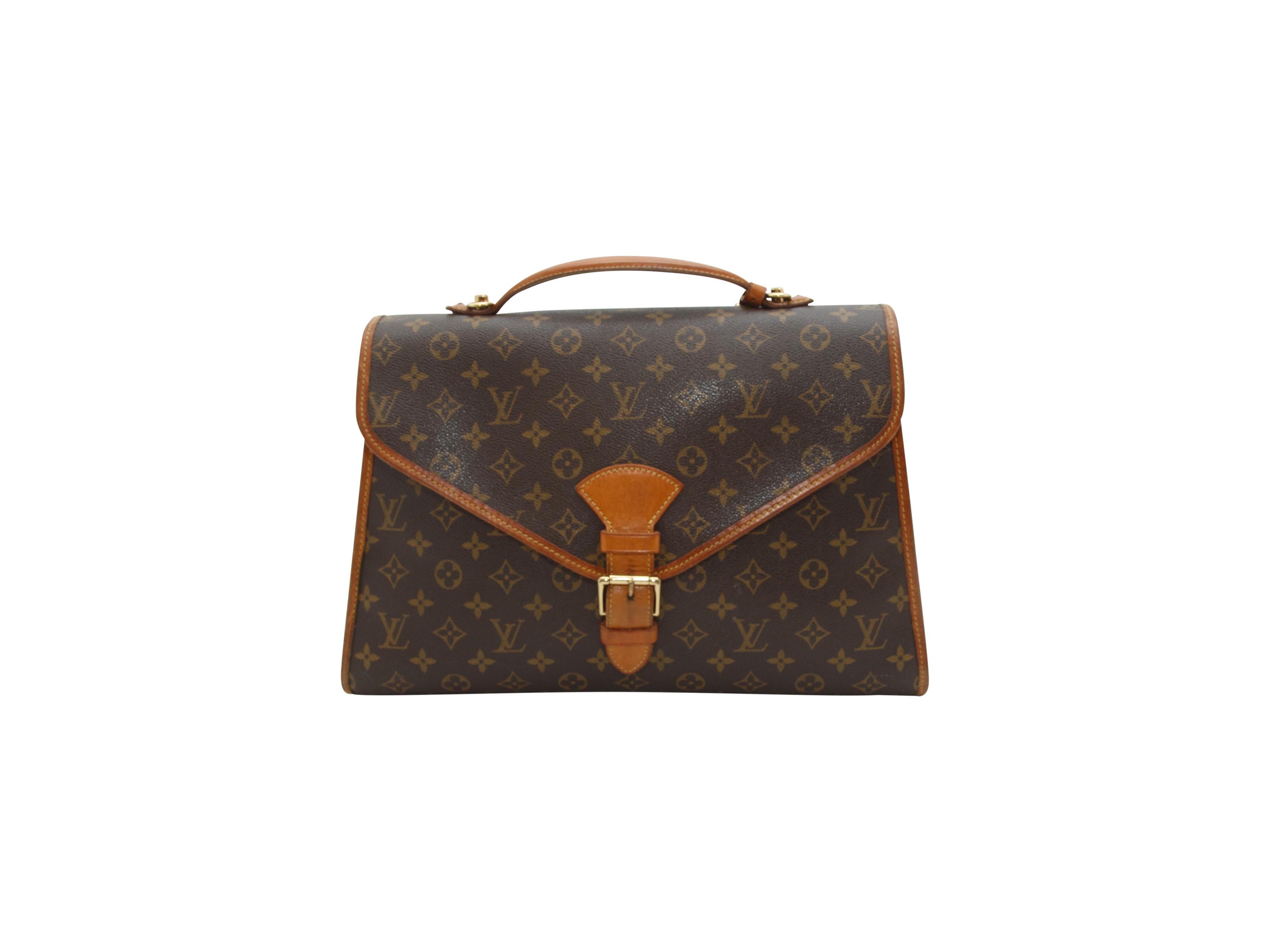 Product details:  Brown monogram coated canvas satchel by Louis Vuitton.  Trimmed with tan leather.  Top carry handle.  Detachable, adjustable shoulder strap.  Front flap with adjustable buckle closure.  Lined interior with inner zip pocket. 