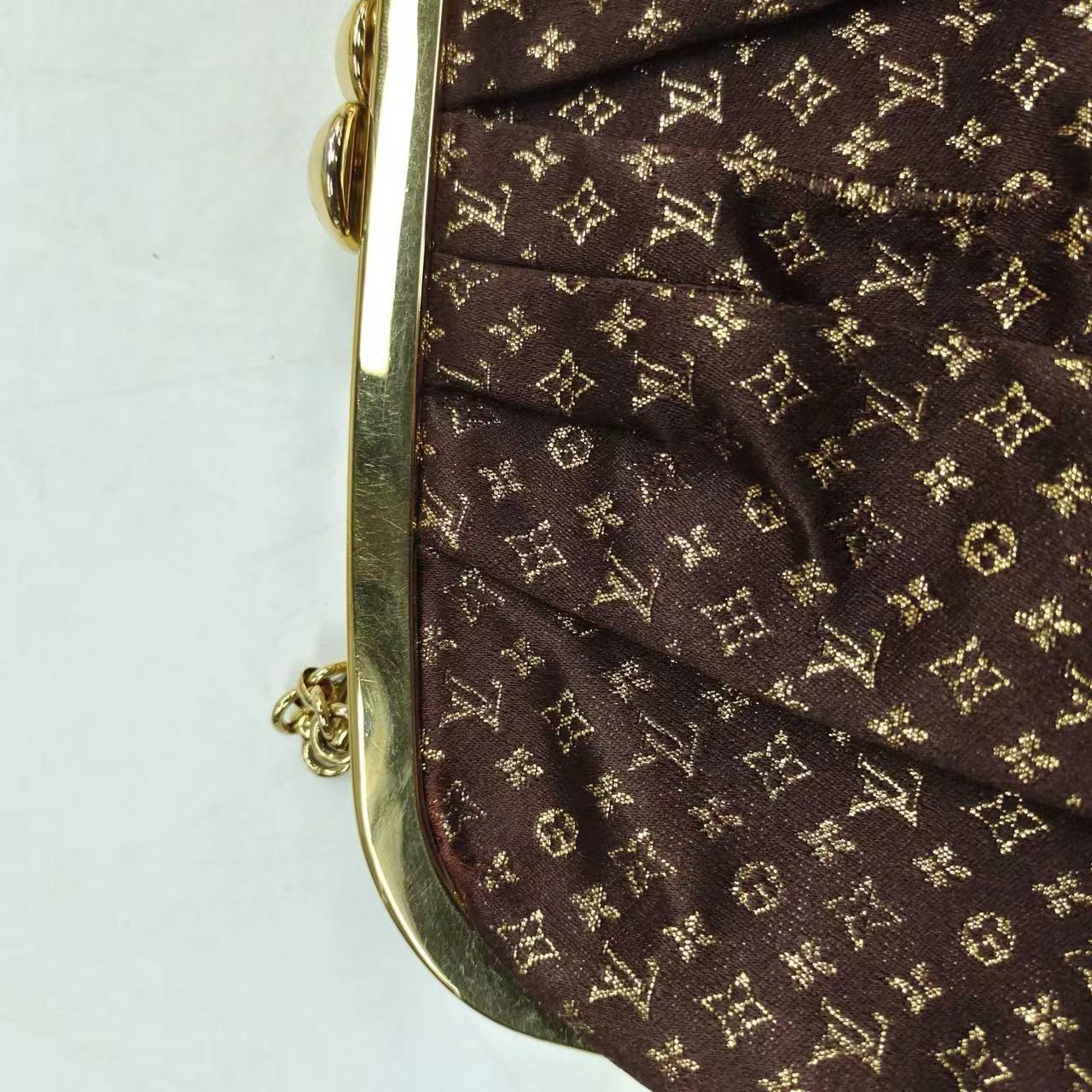 Louis Vuitton Brown Monogram Satin Aumoniere Evening Clutch Bag
These are professional photos of the actual bag offered by Luxbags.
Introducing the Louis Vuitton Brown Monogram Satin Aumoniere Evening Bag - a beautiful complement to any formal