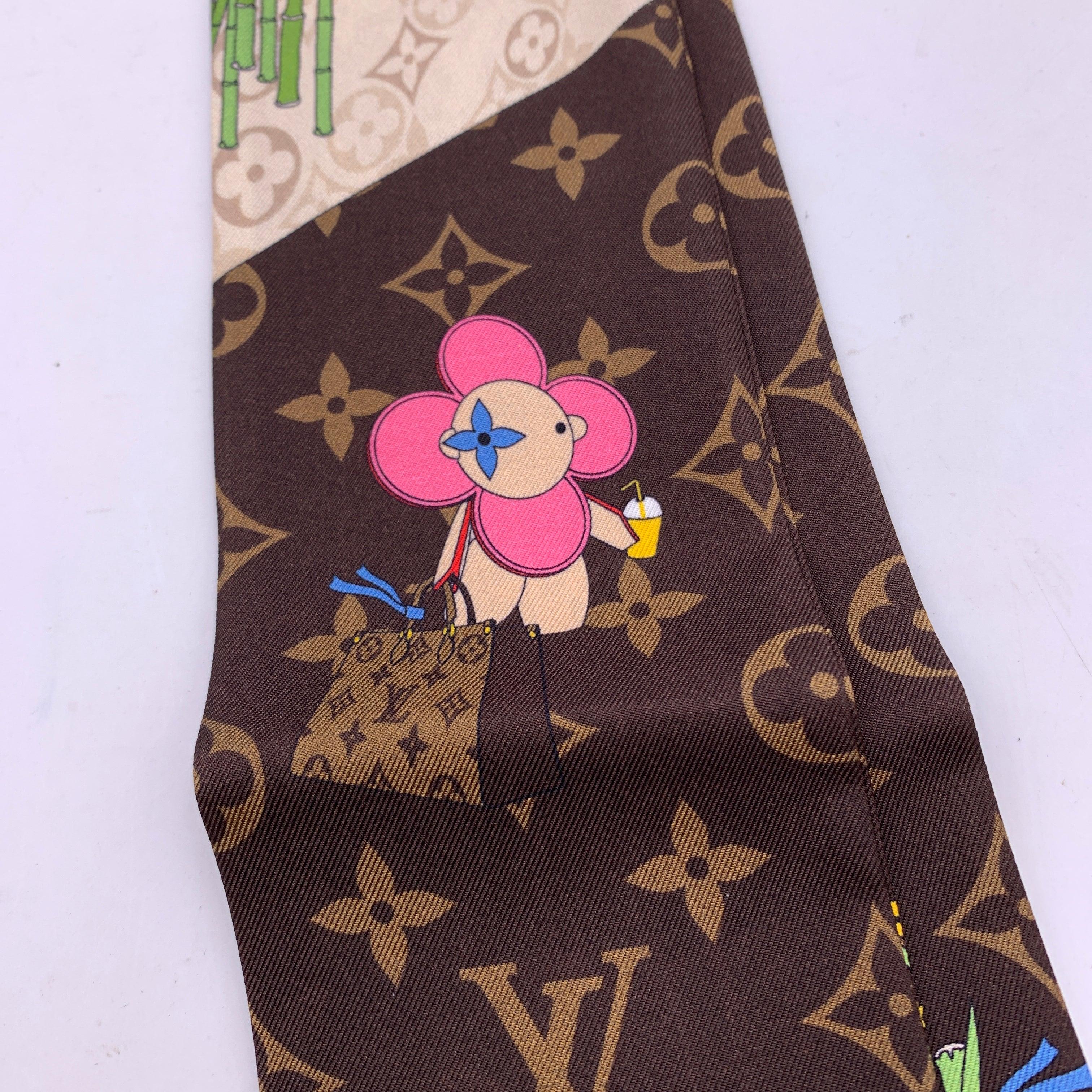 Louis Vuitton 'China Wall' silk bandeau with Vivienne mascot and Panda design. Composition: 100% Silk. Total length: 46.5 inches - 118 cm. Width: 3 inches - 8 cm. Made in Italy. Details MATERIAL: Silk COLOR: Multicolour MODEL: Illustre China Wall