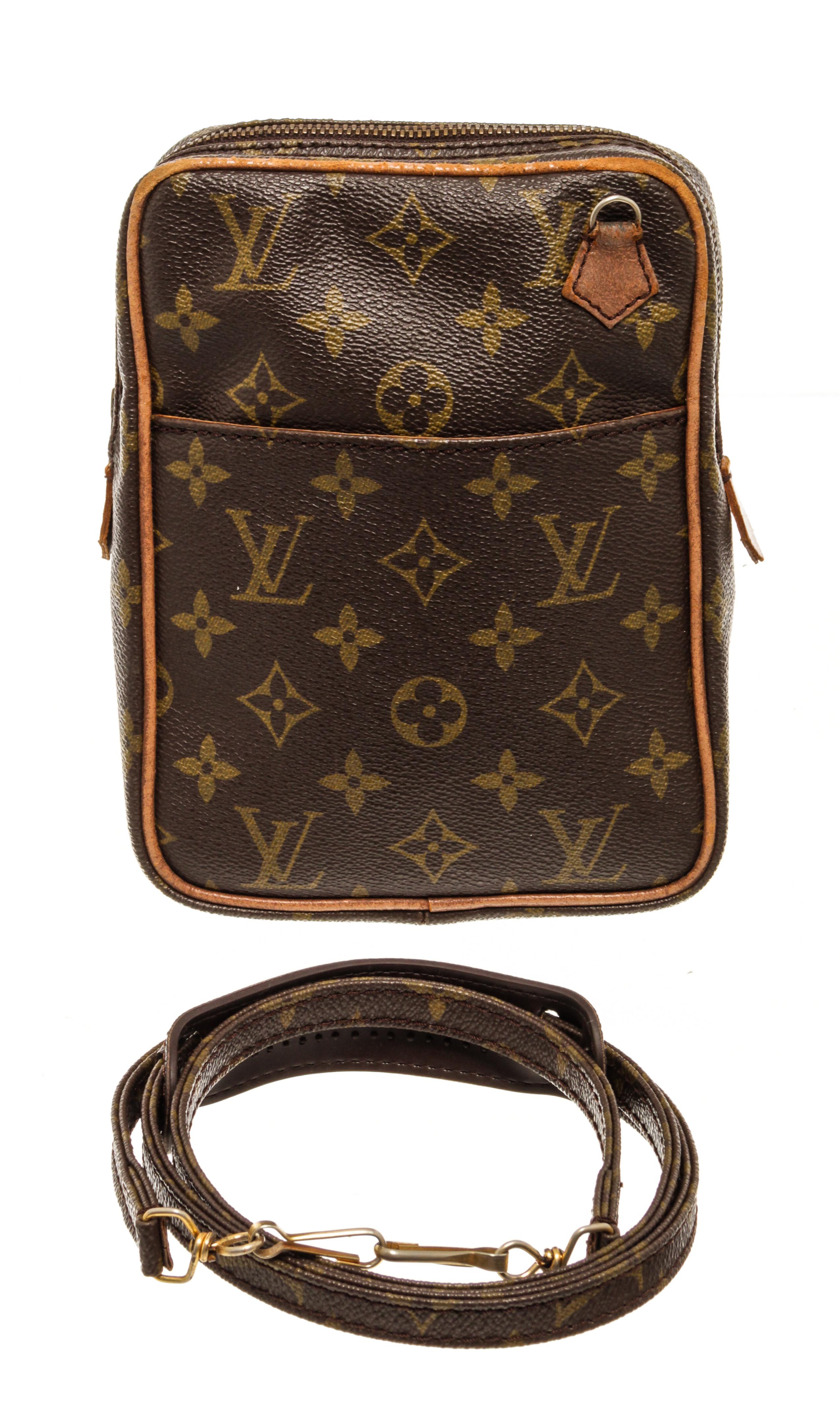 Louis Vuitton Brown Monogram Vintage Danube Bag with adjustable strap, exterior slip pocket, leather lining, interior slip pocket, gold tone hardware, zipper closure.

880115MSC